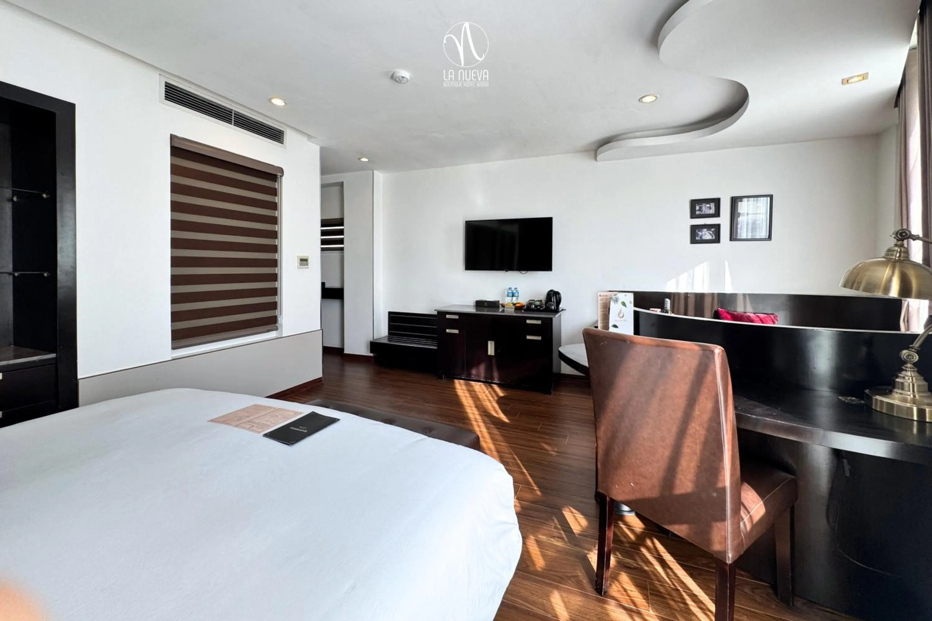 Photo of the whole room, Bed in La Nueva Boutique Hotel Hanoi & Spa