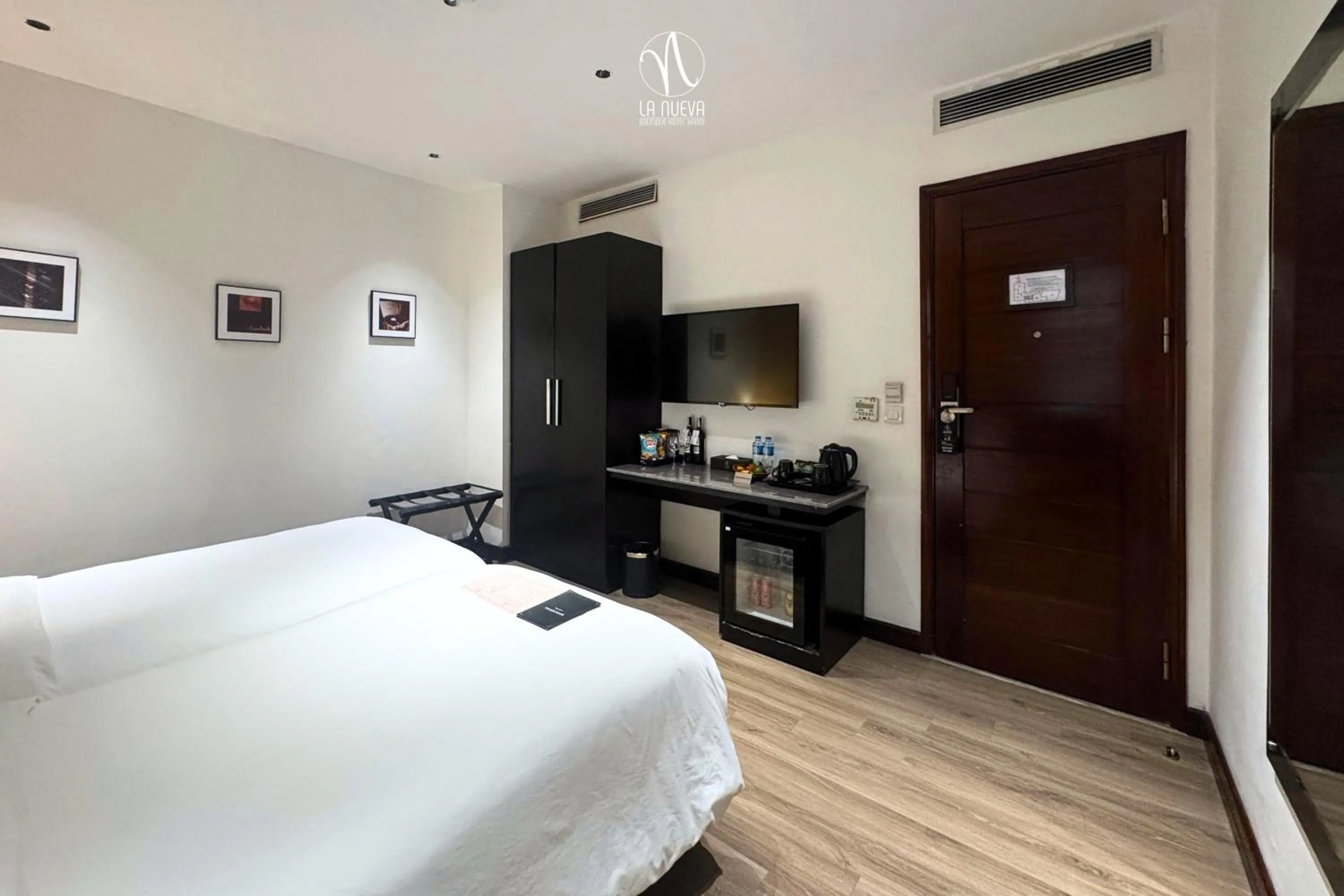 Photo of the whole room, Bed in La Nueva Boutique Hotel Hanoi & Spa