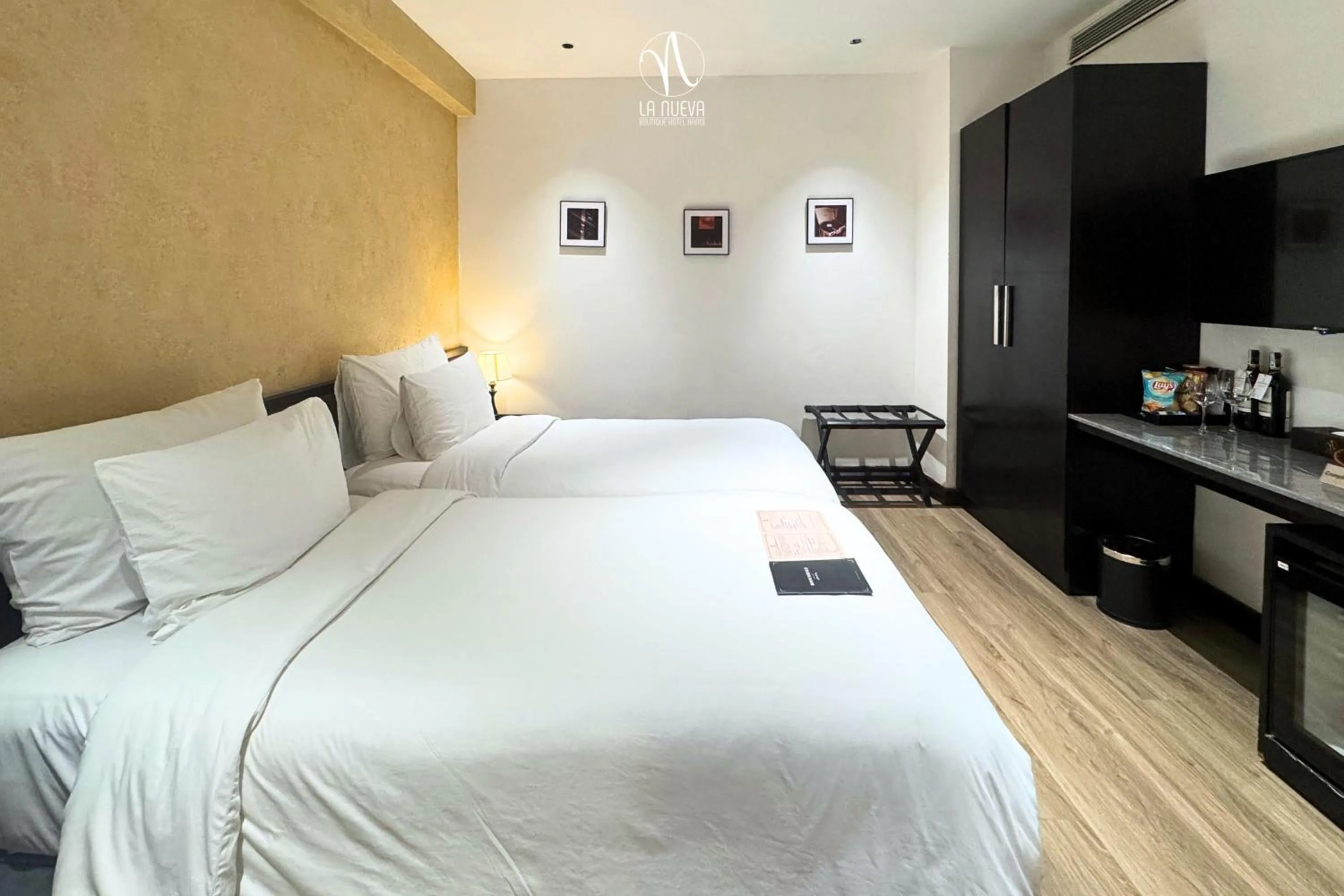 Bed in La Nueva Boutique Hotel Hanoi & Spa