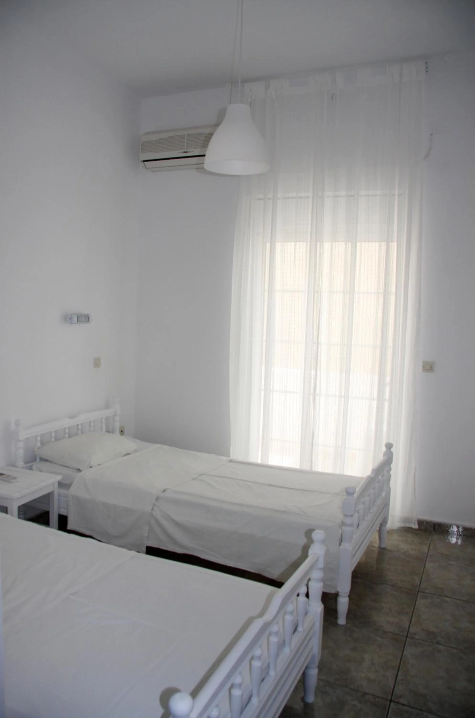 Photo of the whole room, Bed in Armadoros Hotel / Ios Backpackers