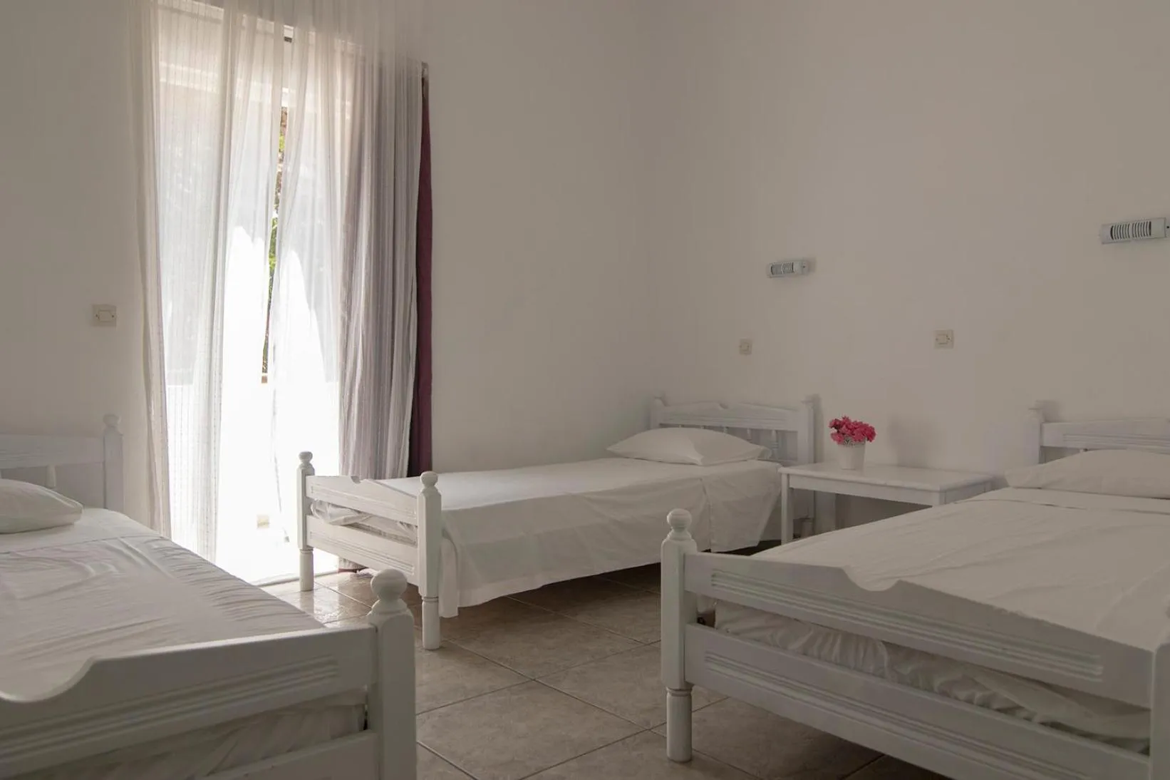 Photo of the whole room, Bed in Armadoros Hotel / Ios Backpackers