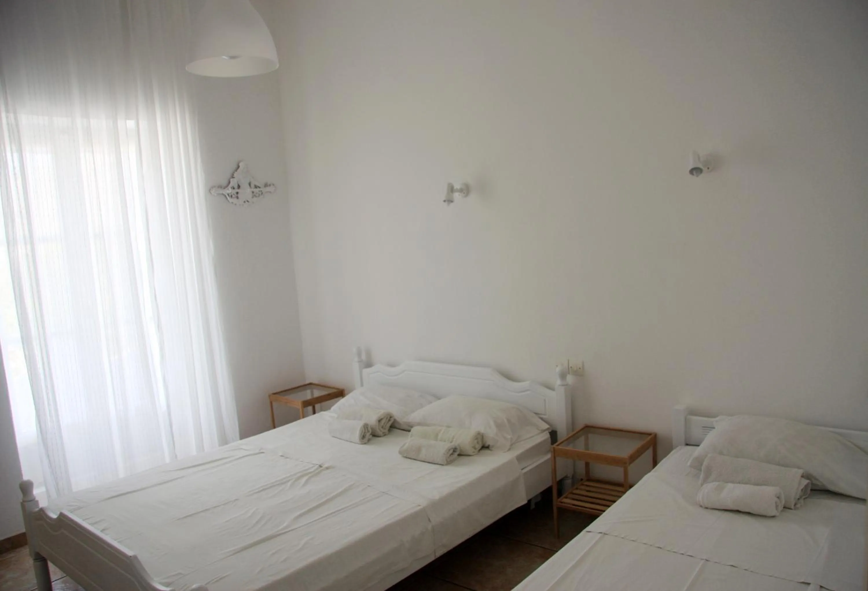 Photo of the whole room, Bed in Armadoros Hotel / Ios Backpackers