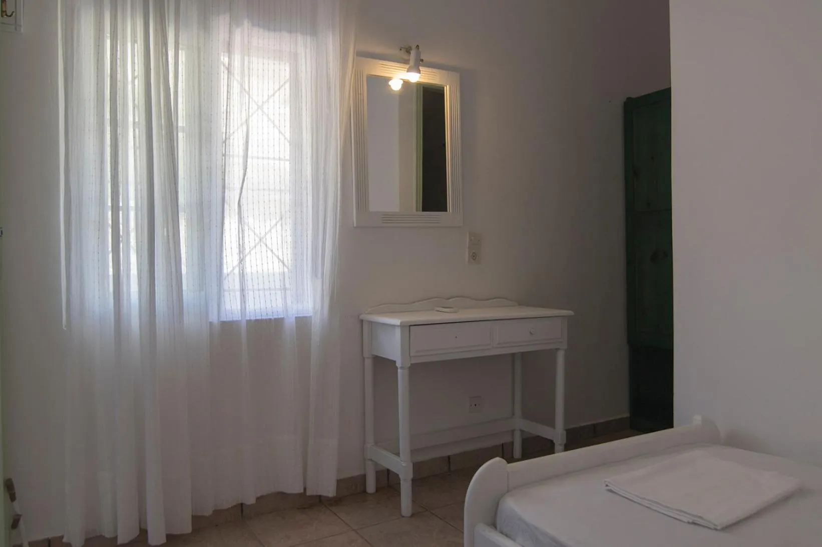 Photo of the whole room, Bed in Armadoros Hotel / Ios Backpackers