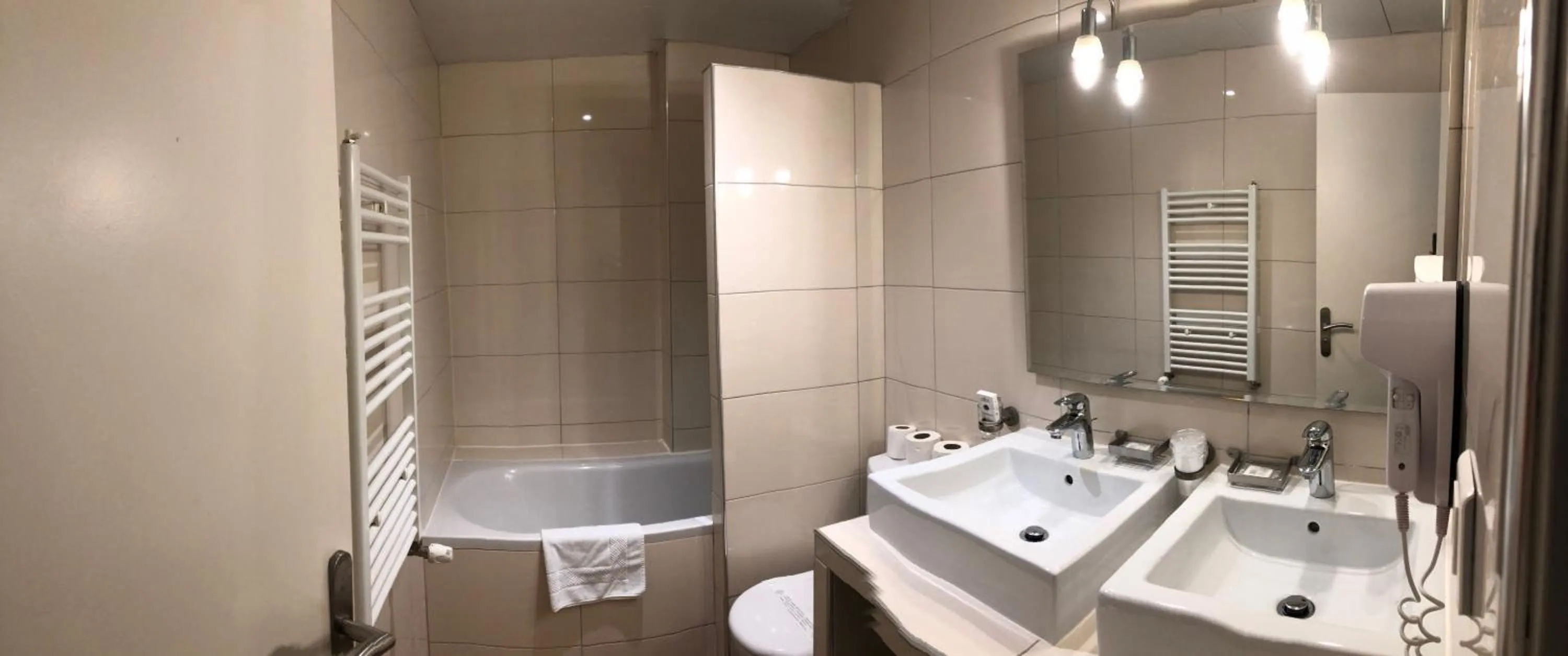 Bathroom in Cosmotel Hotel