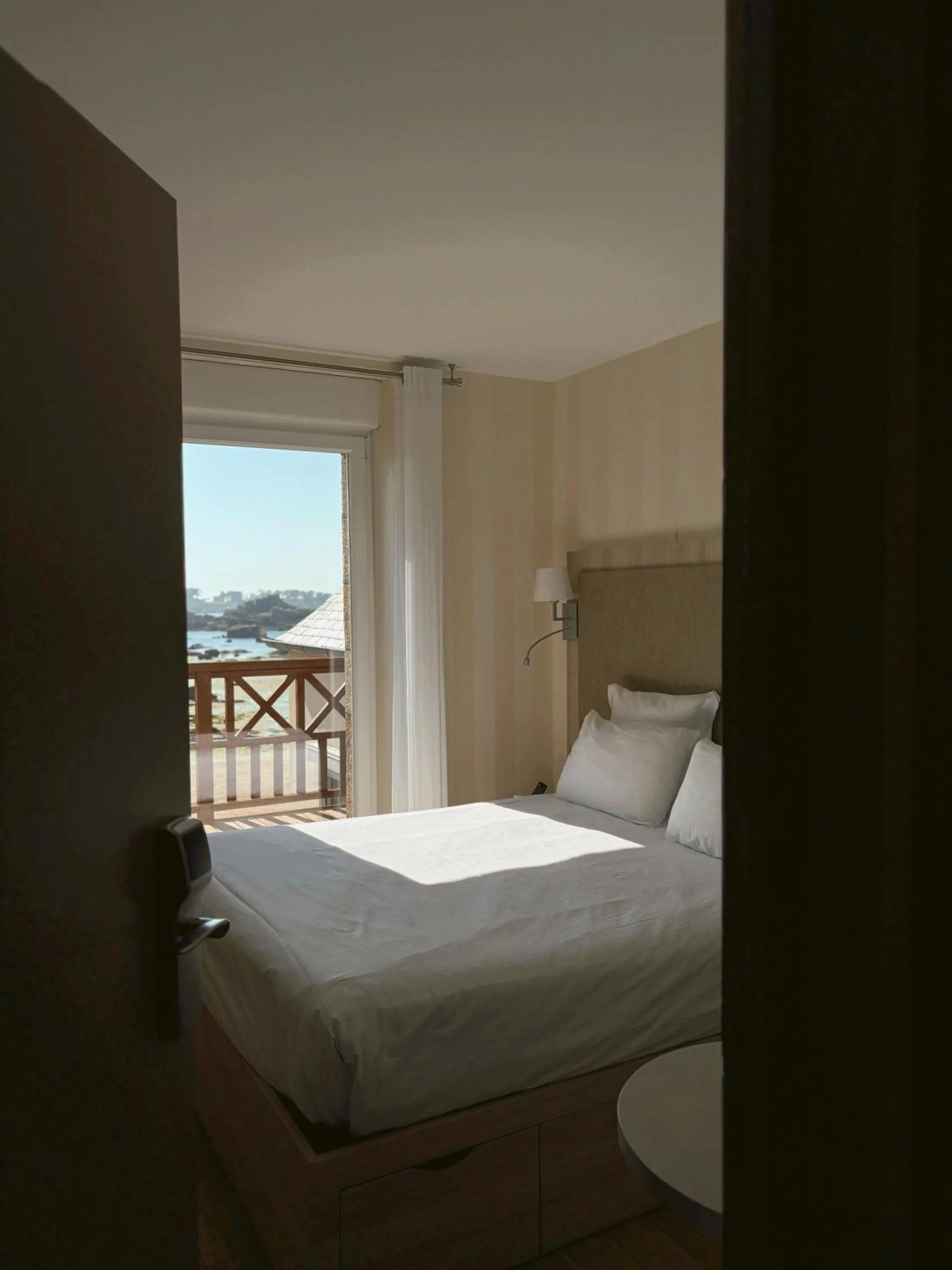 Photo of the whole room, Bed in Logis Hôtel Saint Guirec Et De La Plage