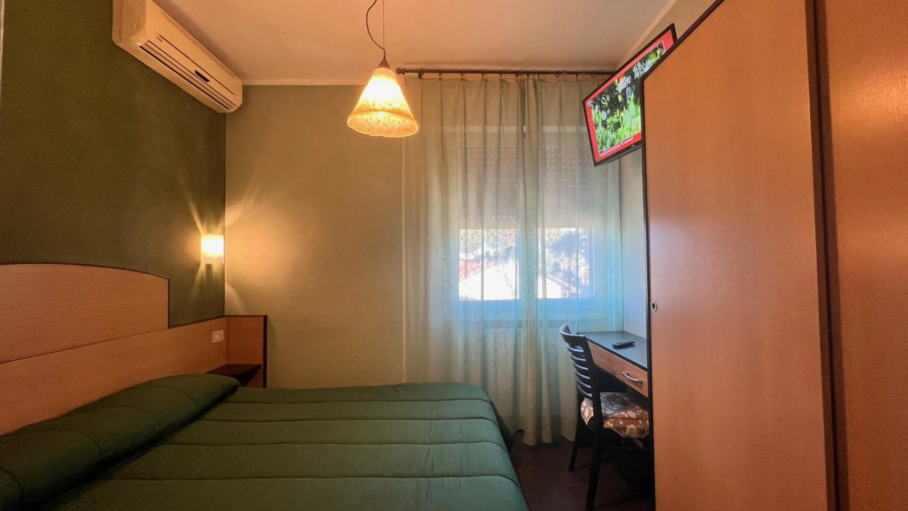 Bedroom in Hotel Il Cavaliere Nero