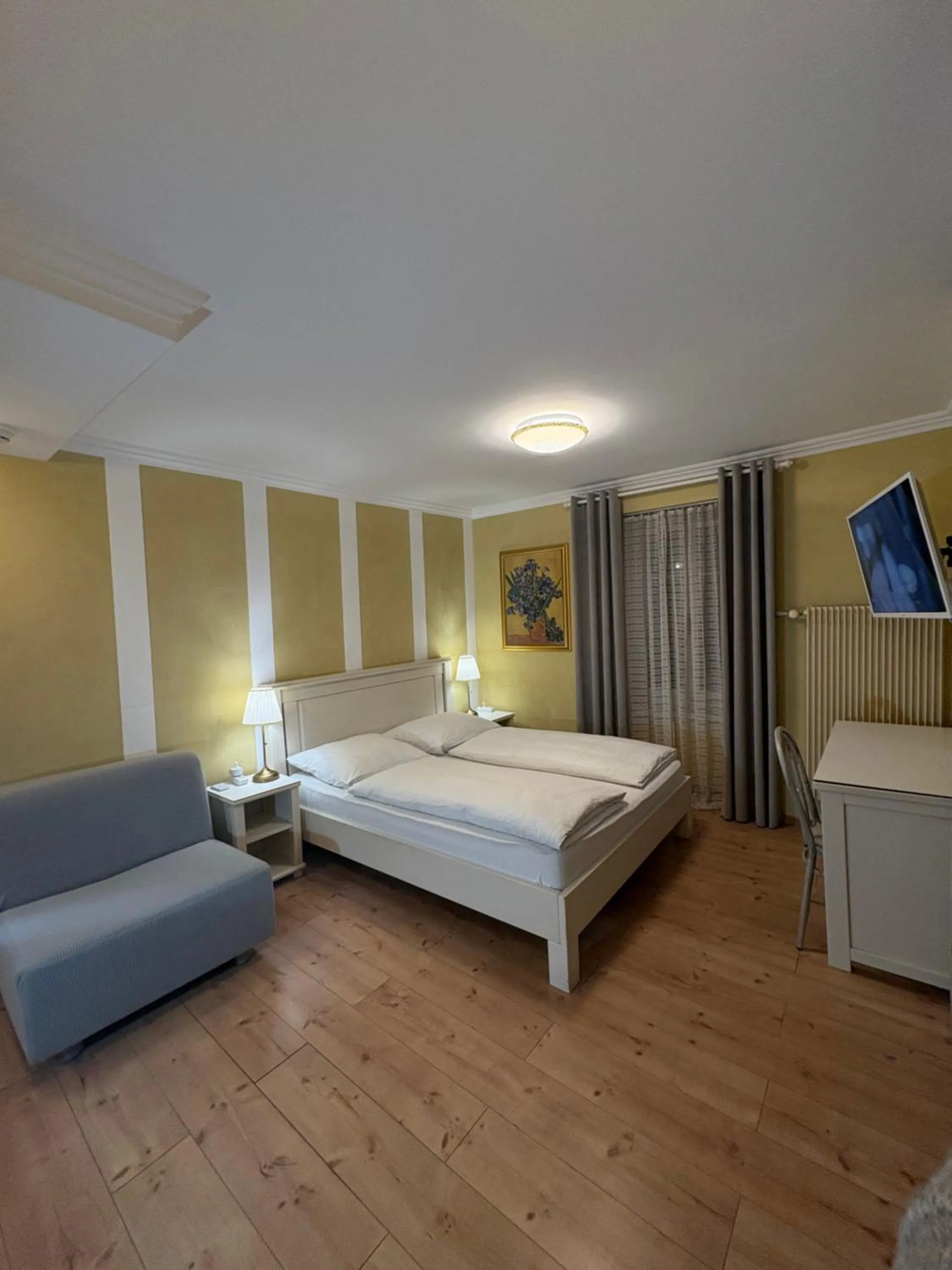 Living room, Bed in Esos Hotel Quelle