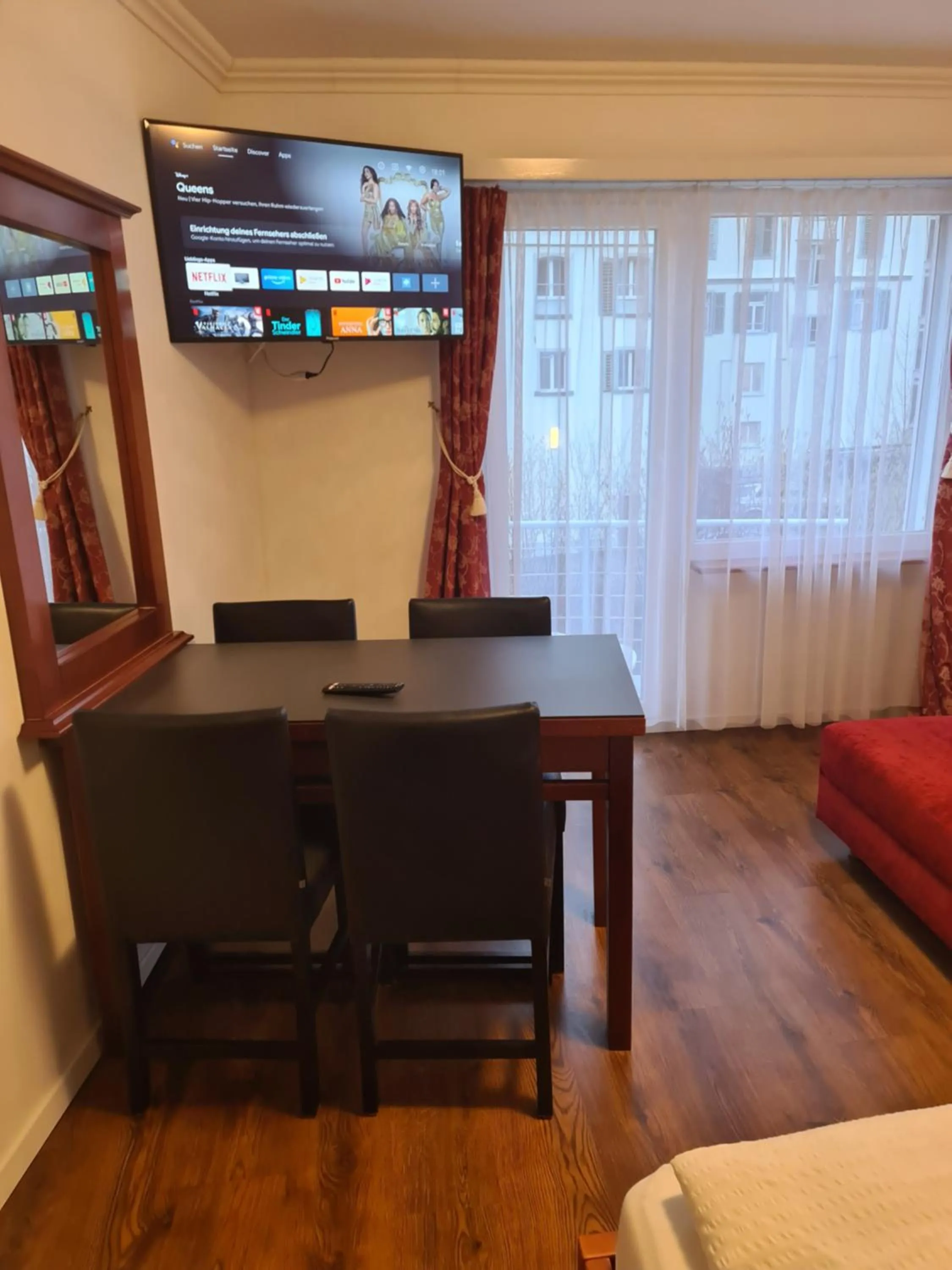 Communal lounge/ TV room in Esos Hotel Quelle