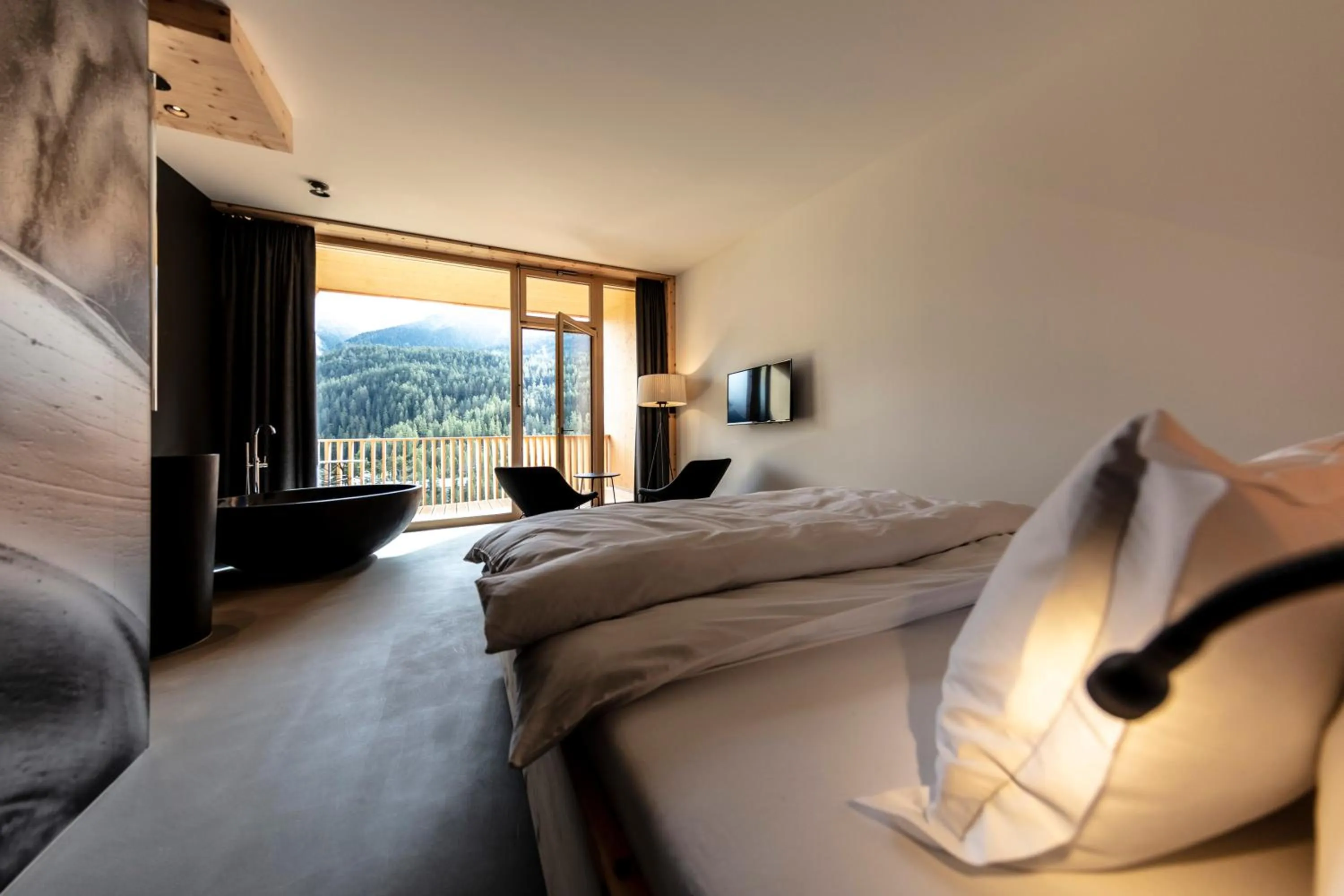 Bed in Hotel Arnica Scuol - Adults Only