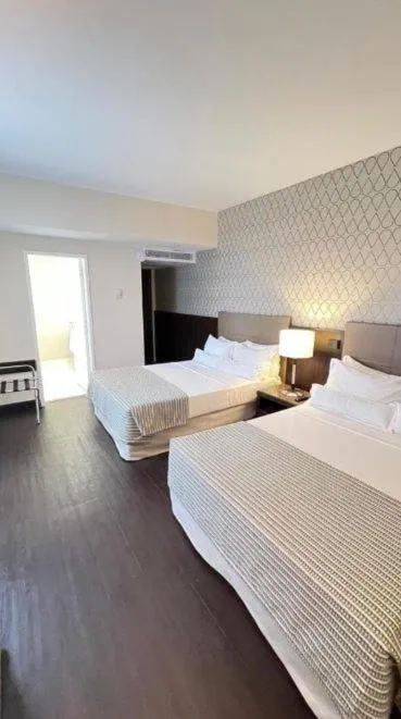 Bed in Bourbon Hotel & Suites Curitiba