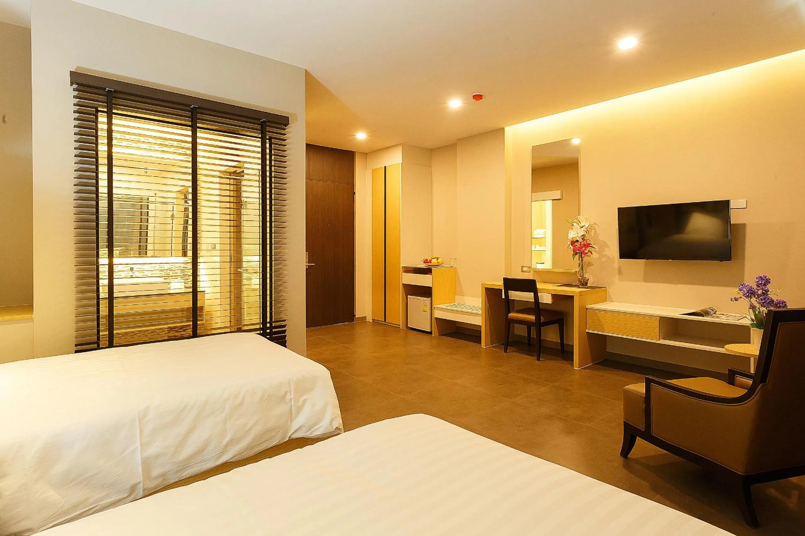 Bed in Green Point Residence Hotel