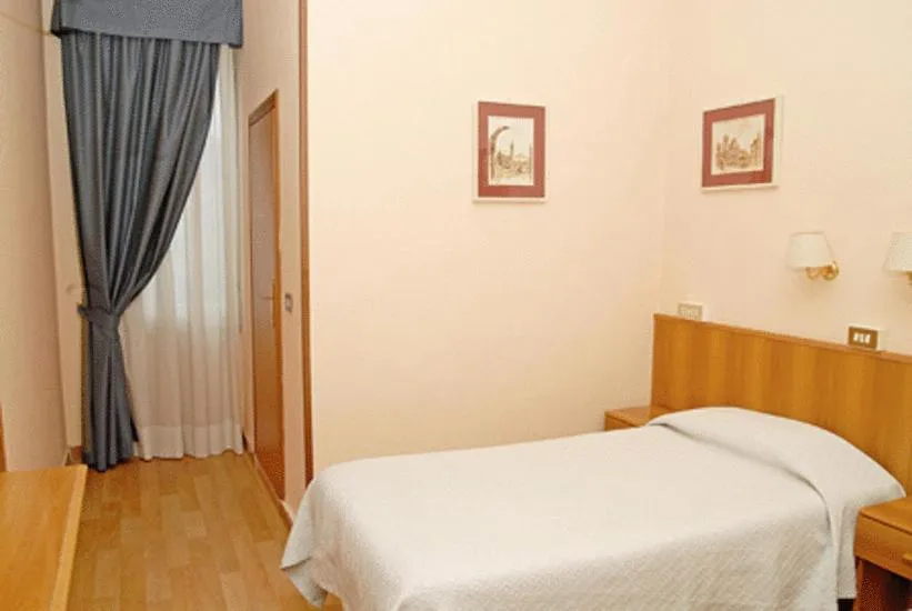 Photo of the whole room, Bed in Hotel Porziuncola