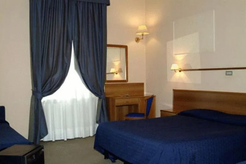 Photo of the whole room, Bed in Hotel Porziuncola