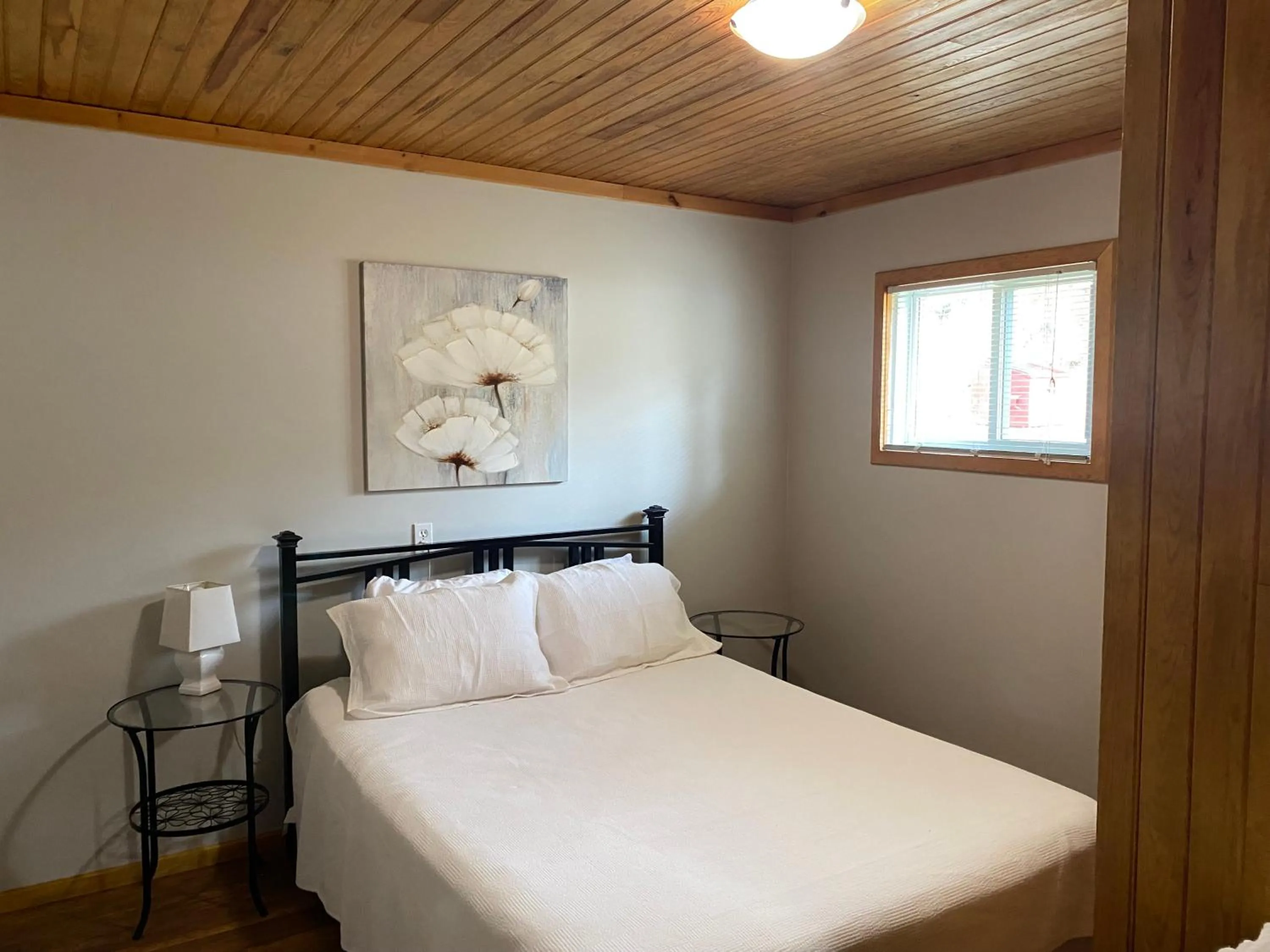 Bed in Merland Park Cottages and Motel