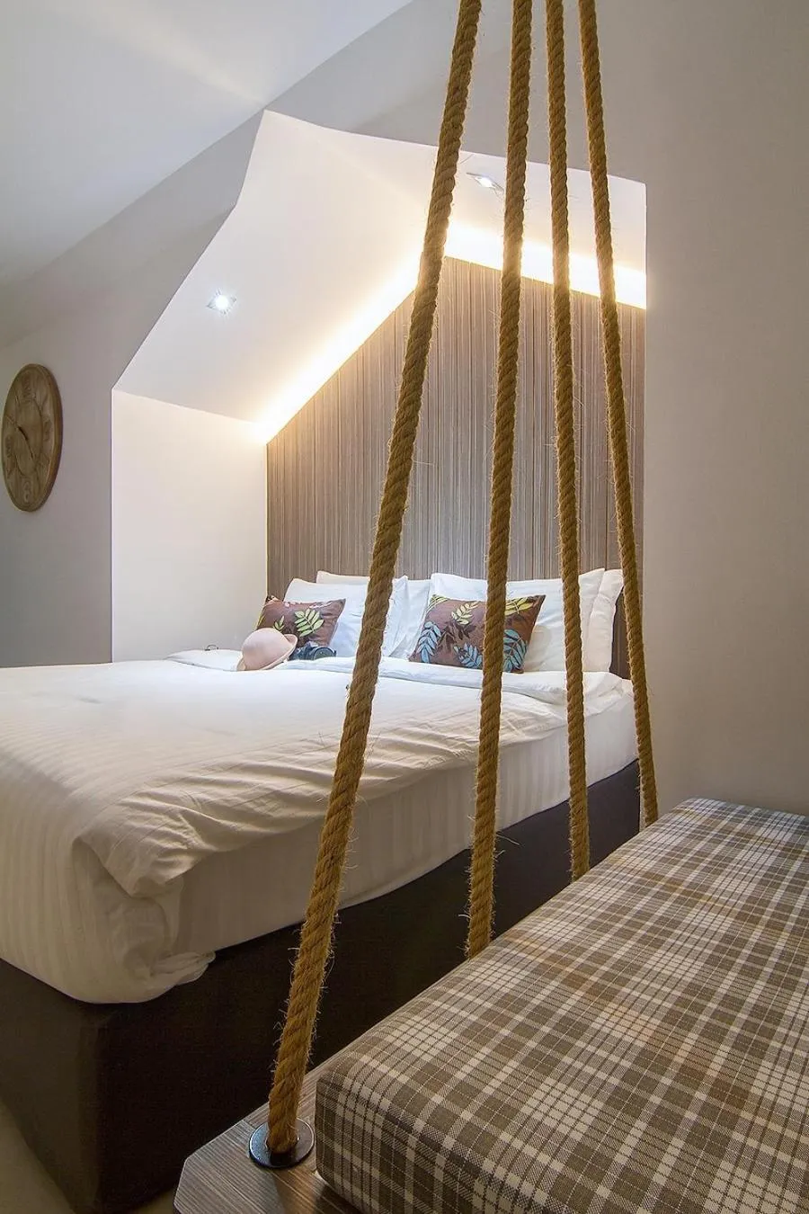 Bed in Bossotel Chiang Mai