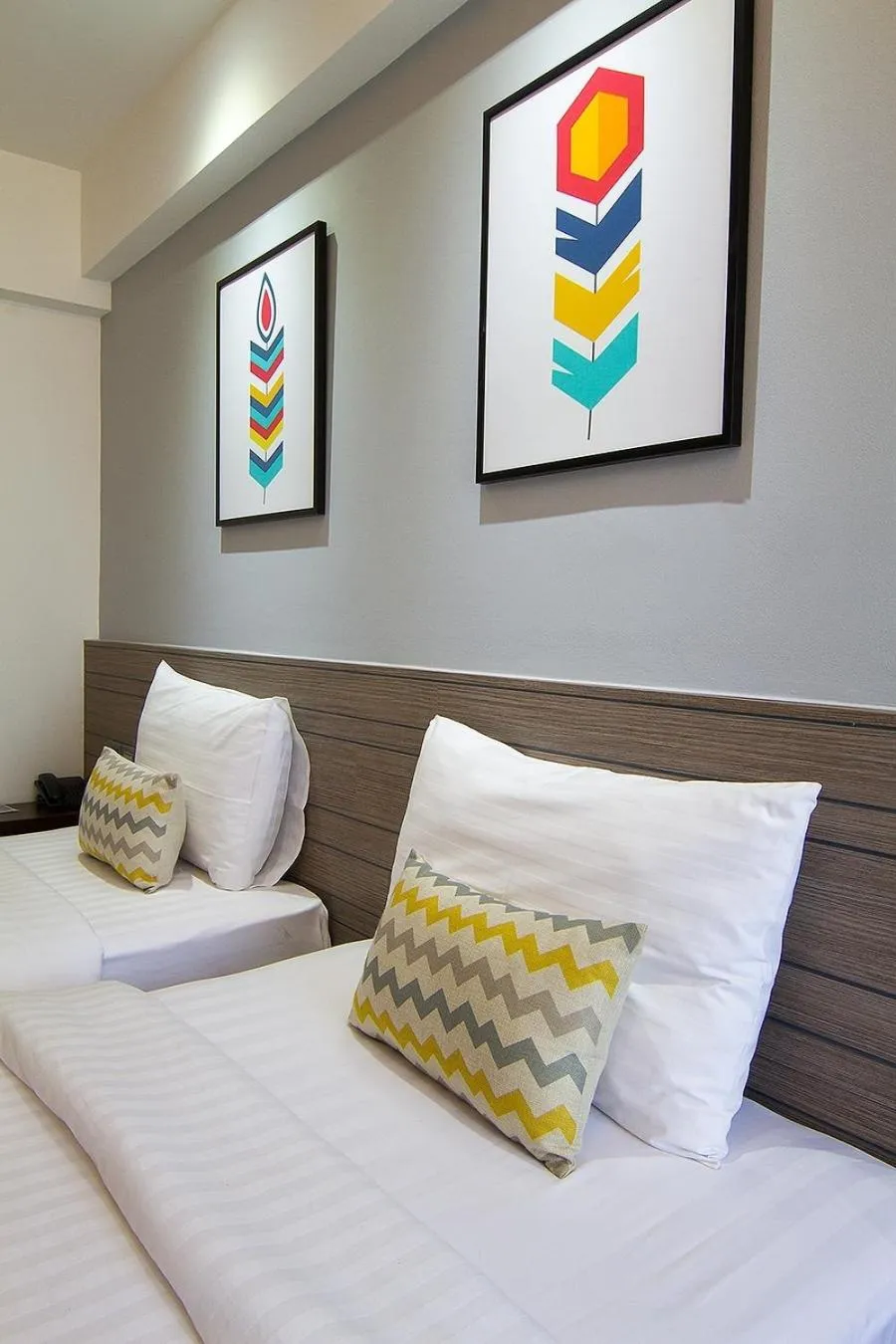 Bed in Bossotel Chiang Mai