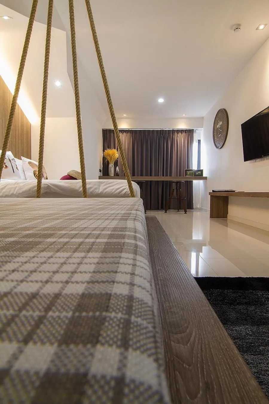 Bed in Bossotel Chiang Mai