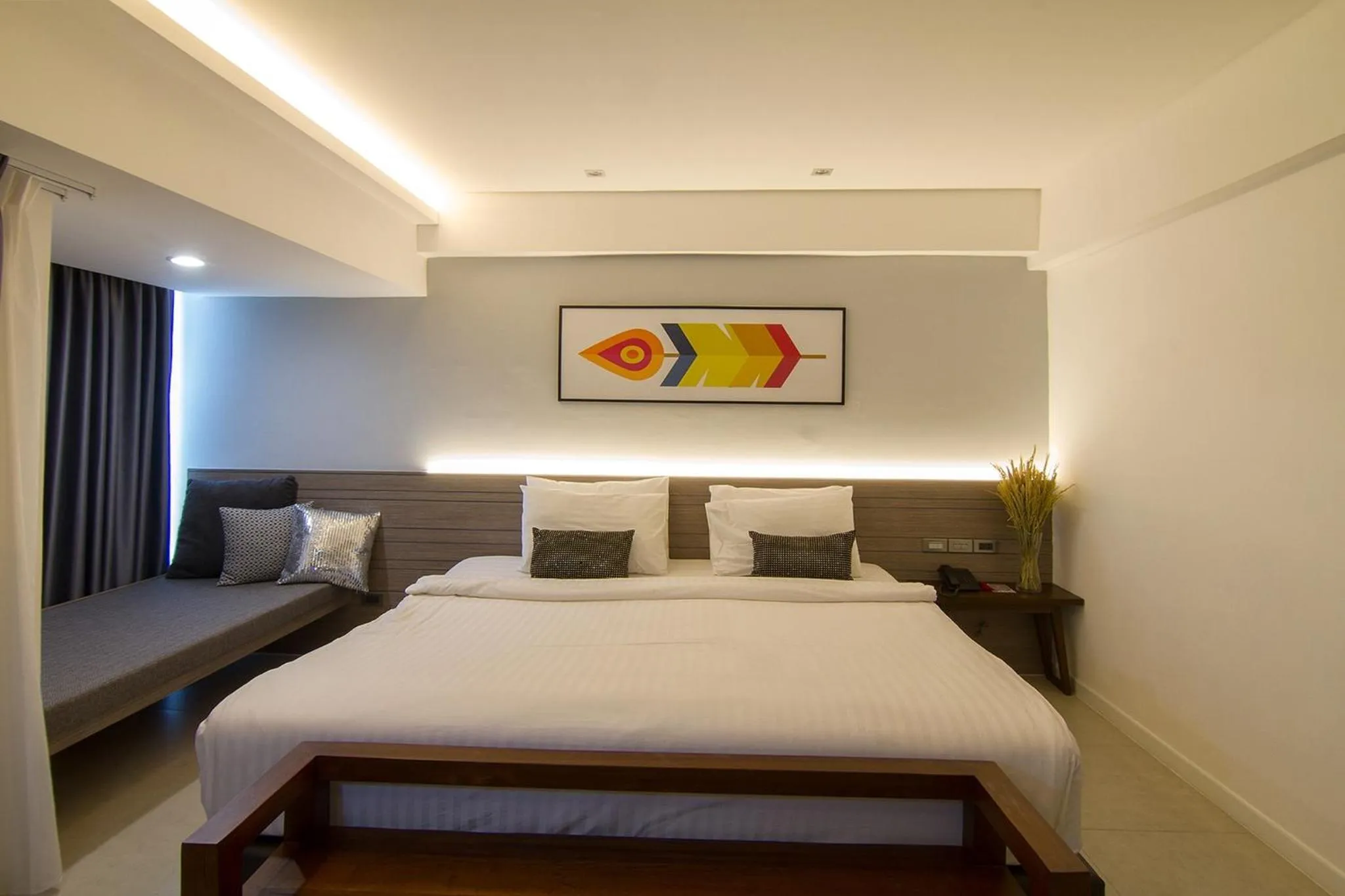 Bed in Bossotel Chiang Mai