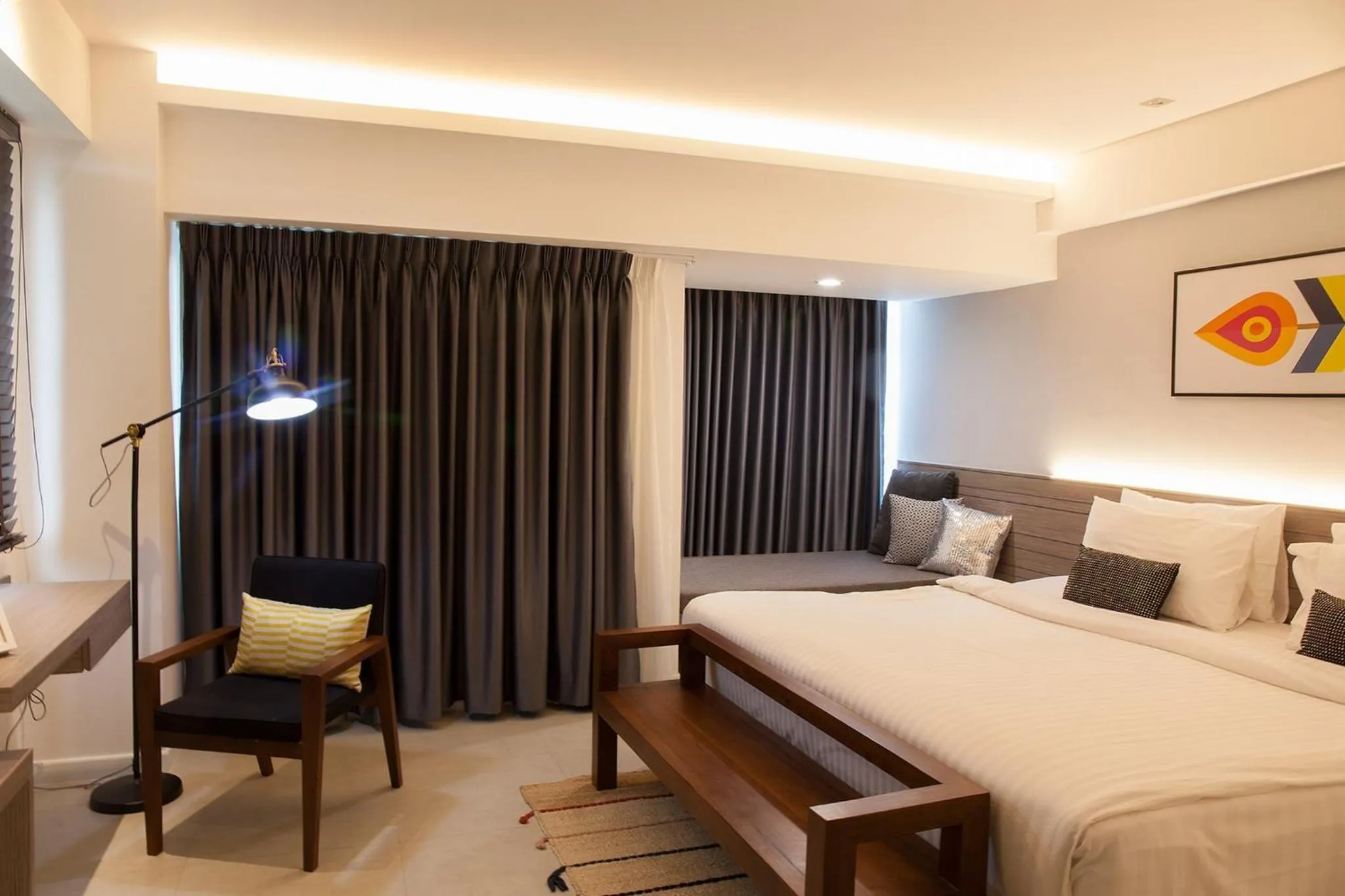 Bed in Bossotel Chiang Mai