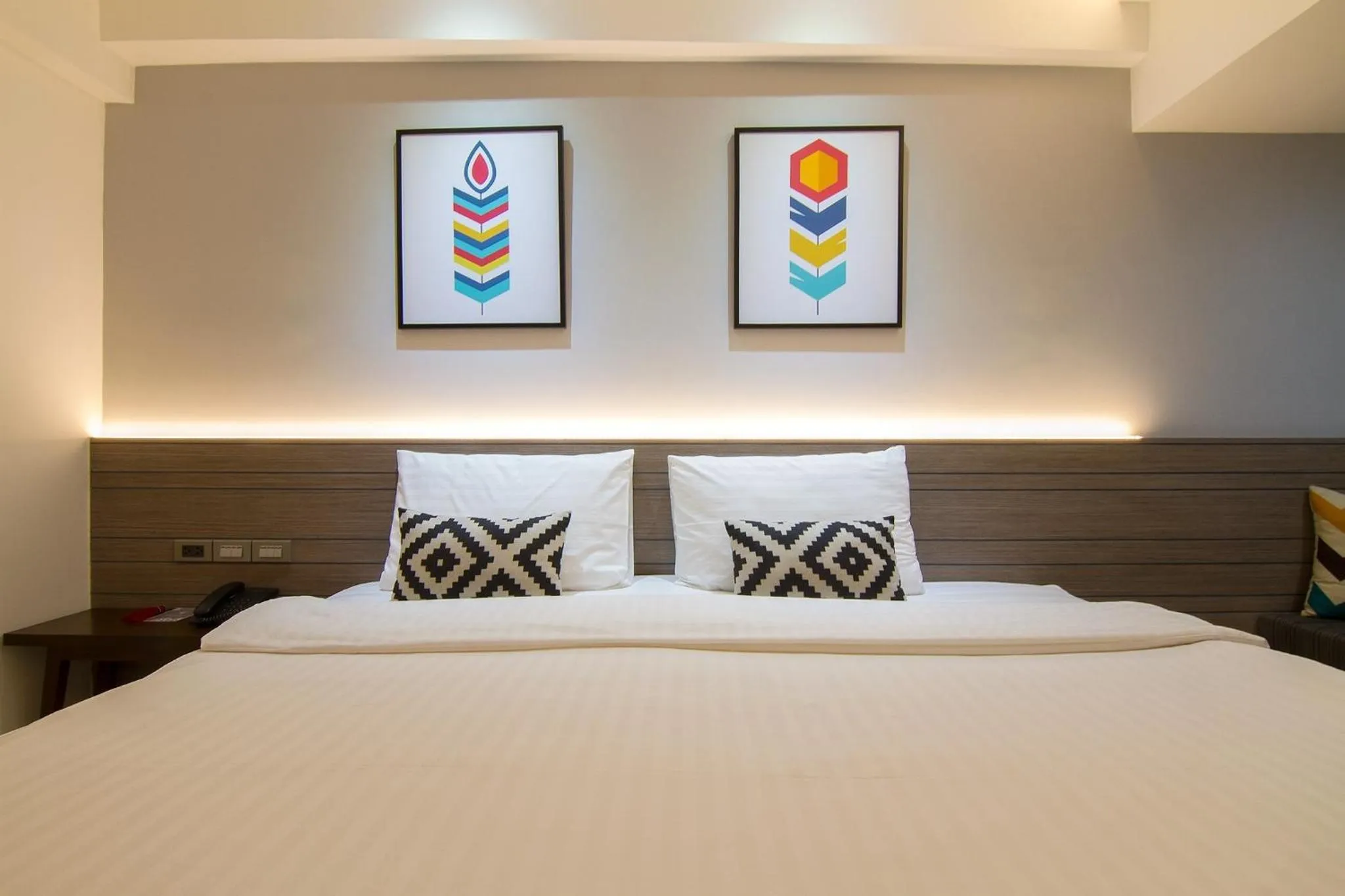 Bed in Bossotel Chiang Mai