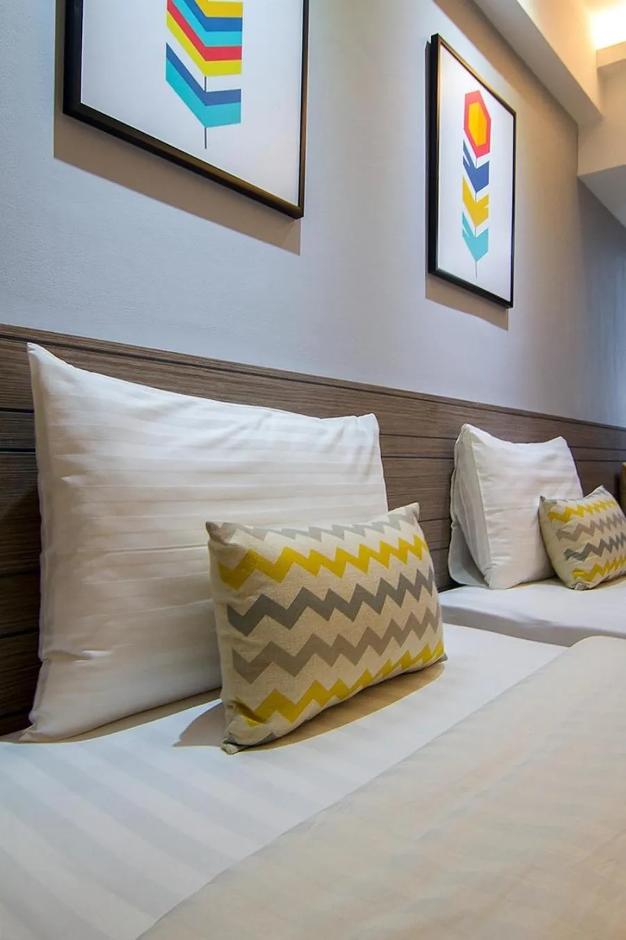 Bed in Bossotel Chiang Mai