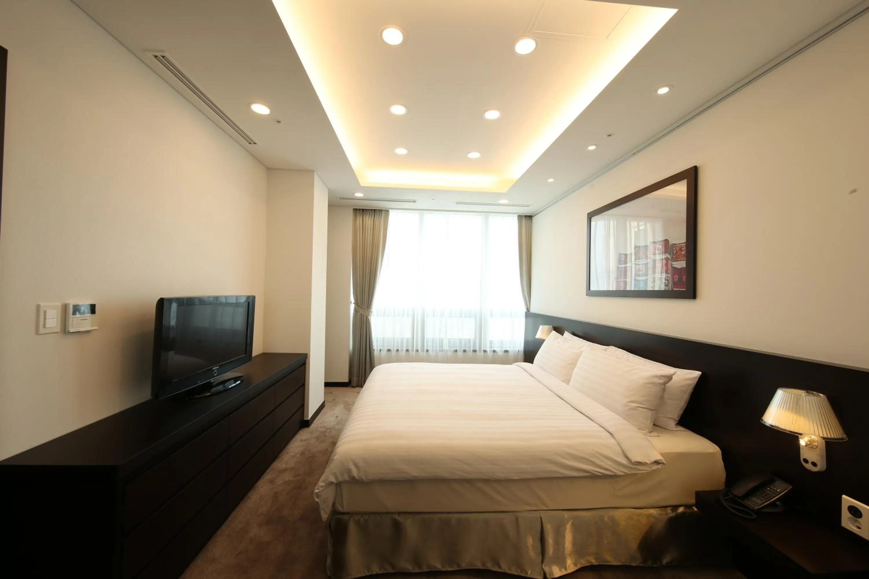 Bed in Orakai Insadong Suites