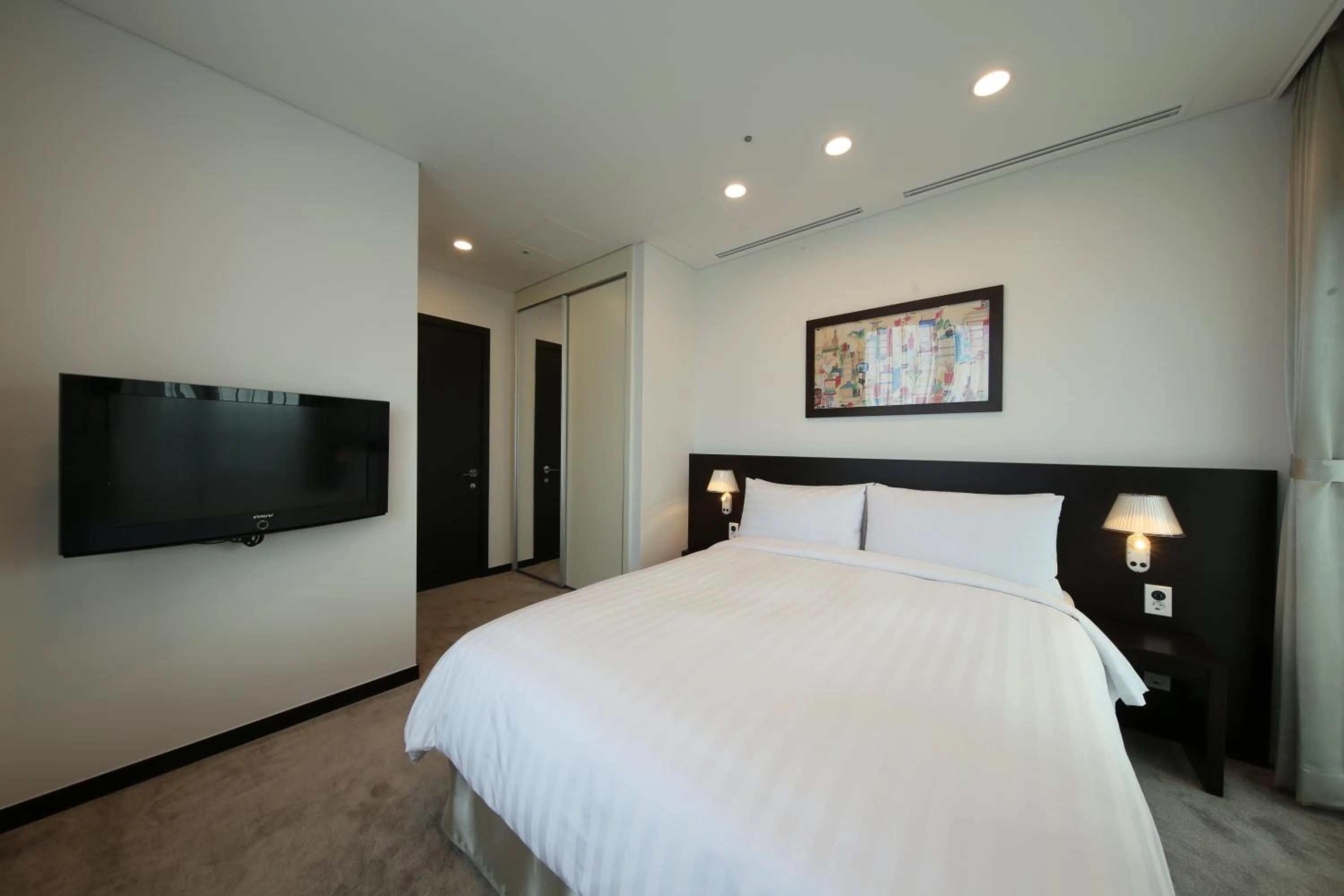 Bed in Orakai Insadong Suites