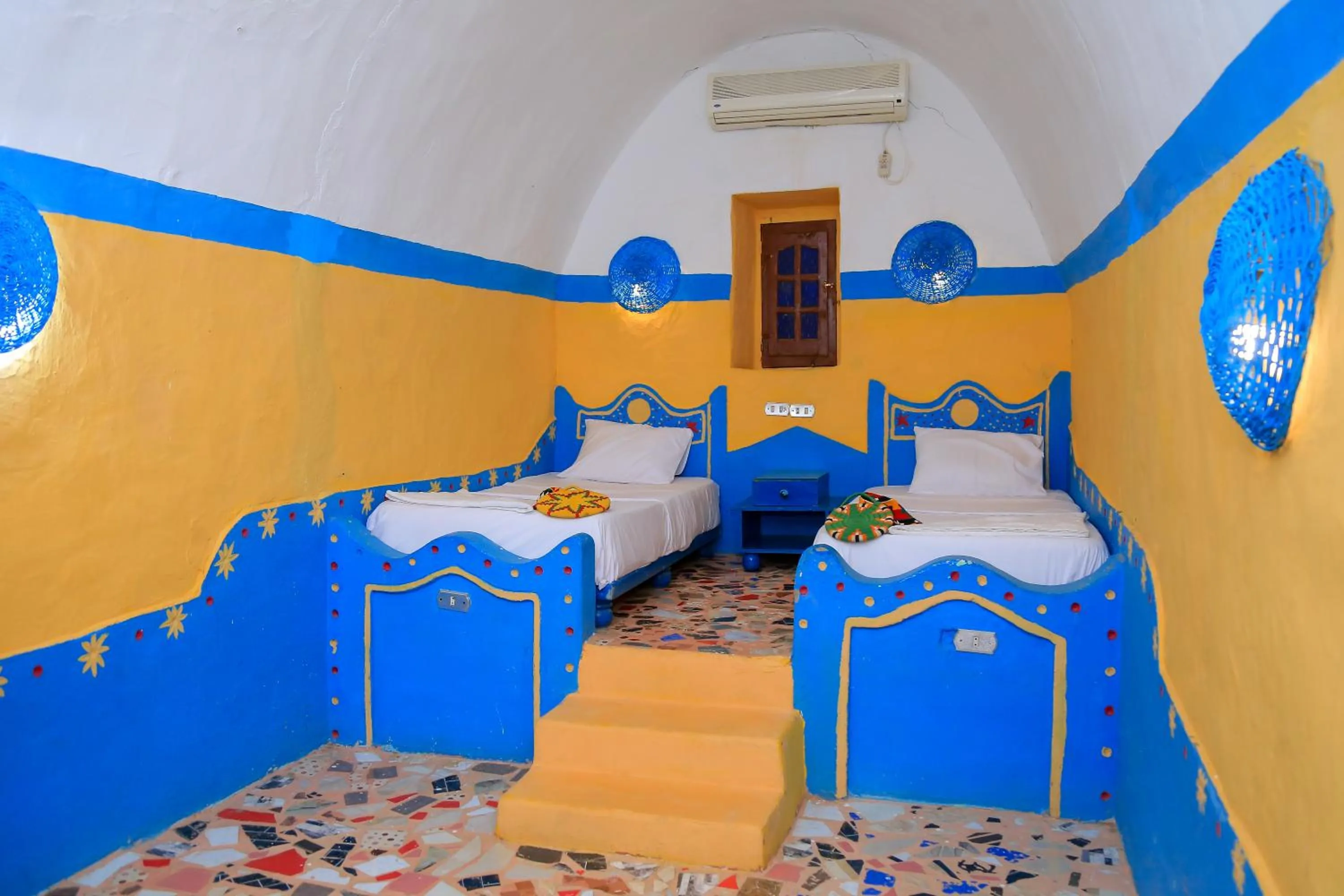 Bed in Nubian Palace Eco Lodge