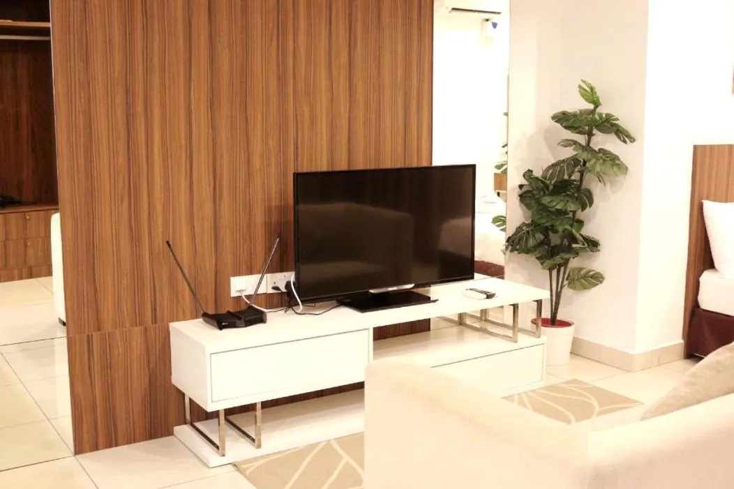 TV and multimedia, Bed in Hejmo Suites