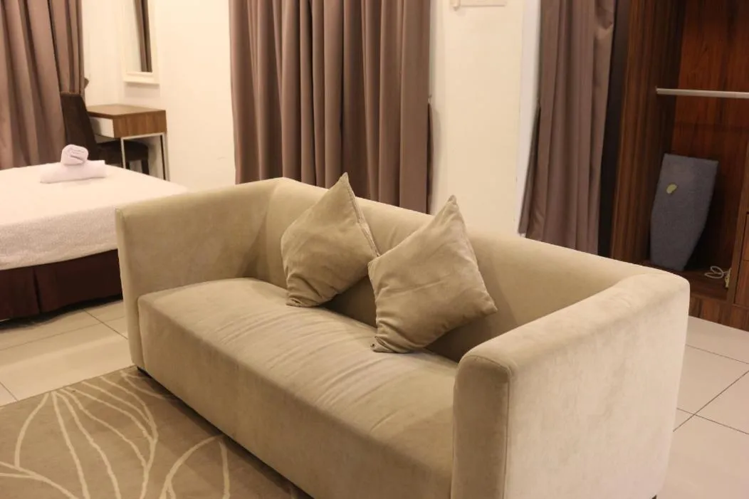 Living room, Bed in Hejmo Suites