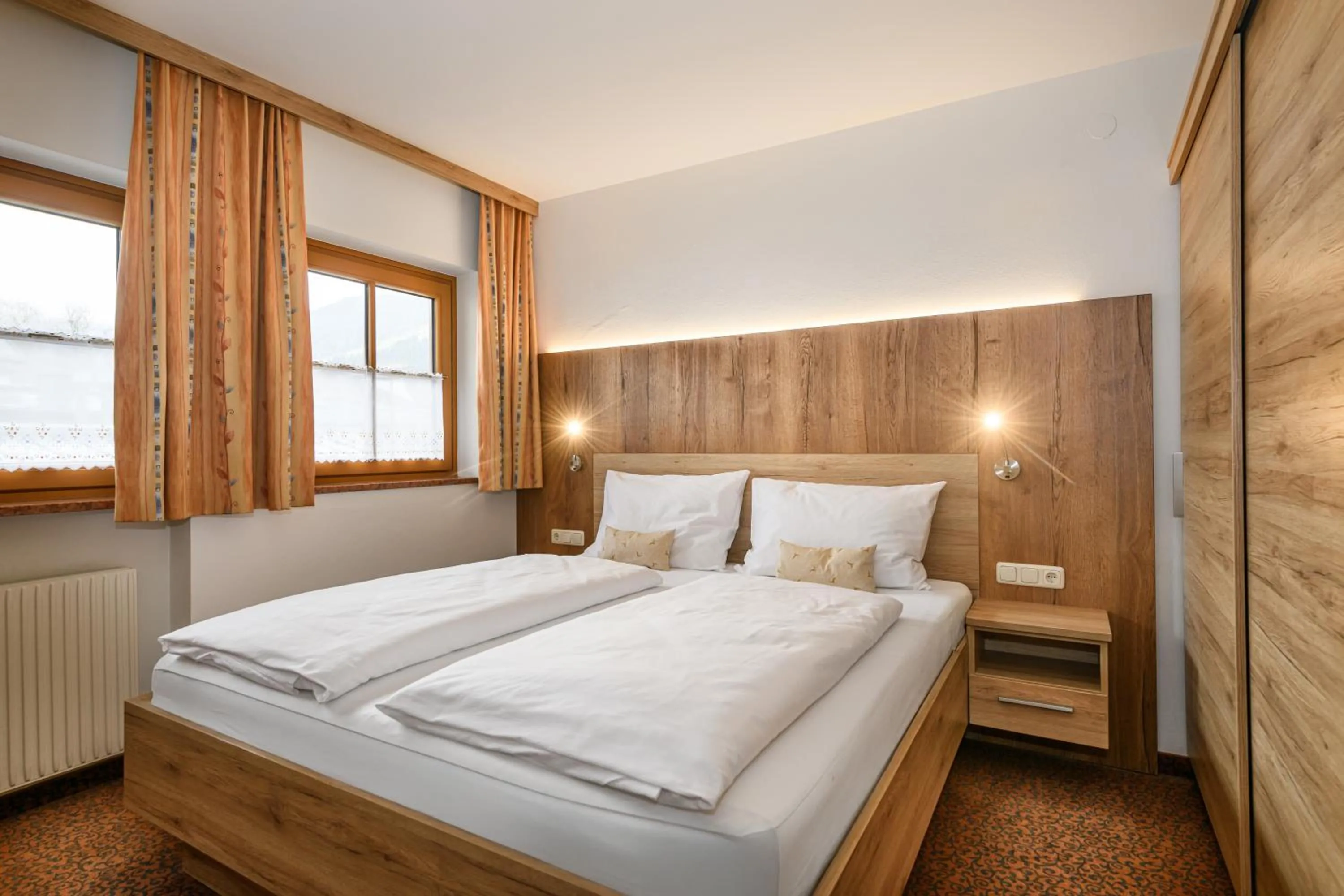 Bedroom, Bed in Ferienhaus Birgit - inklusive Eintritt Alpentherme Bad Hofgastein