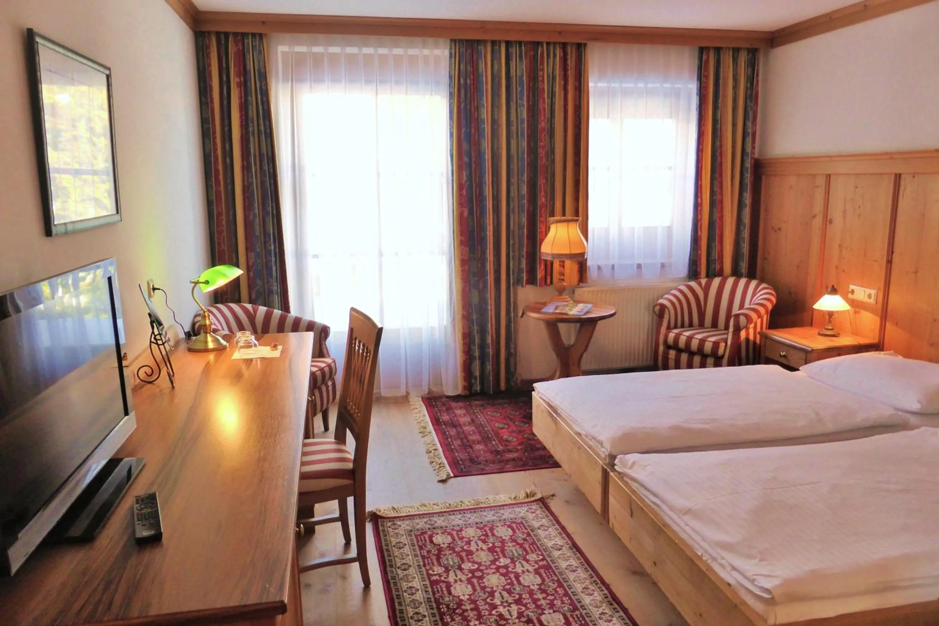 Photo of the whole room, Bed in Gasthof Hotel Doktorwirt