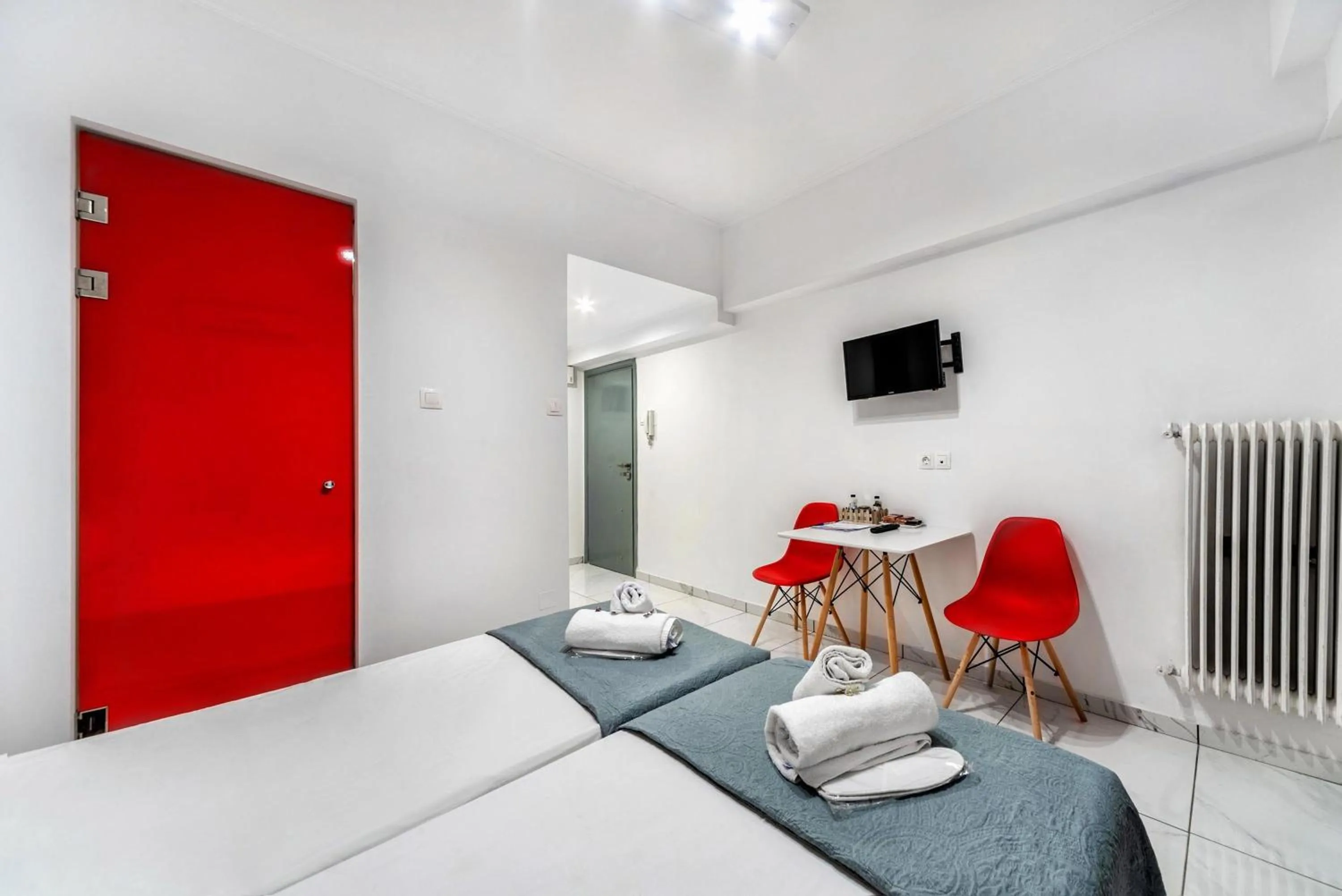 Bed in City Center Studios by Cretan Houses