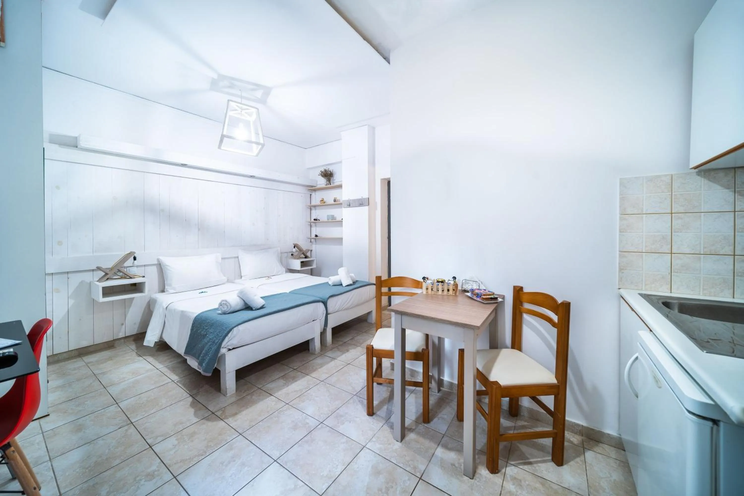 Bed in City Center Studios by Cretan Houses