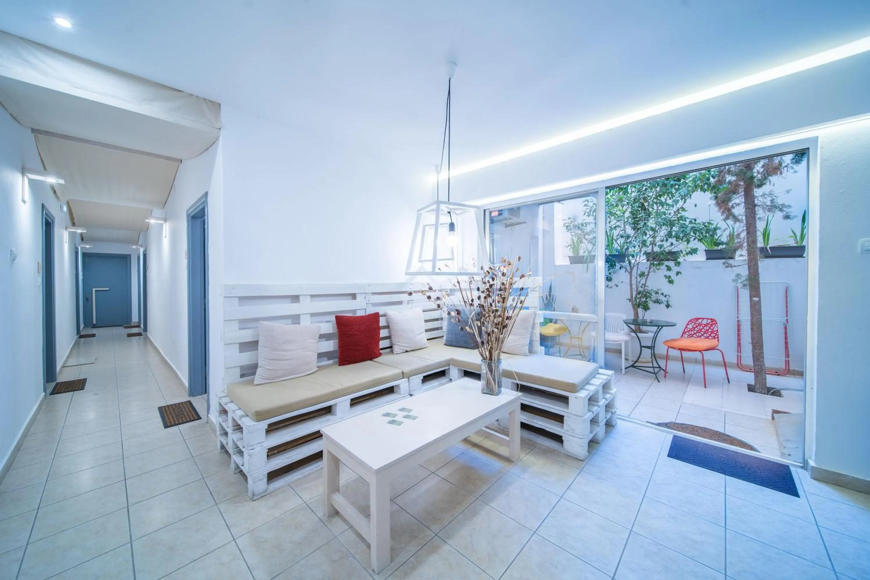 Seating area in City Center Studios by Cretan Houses