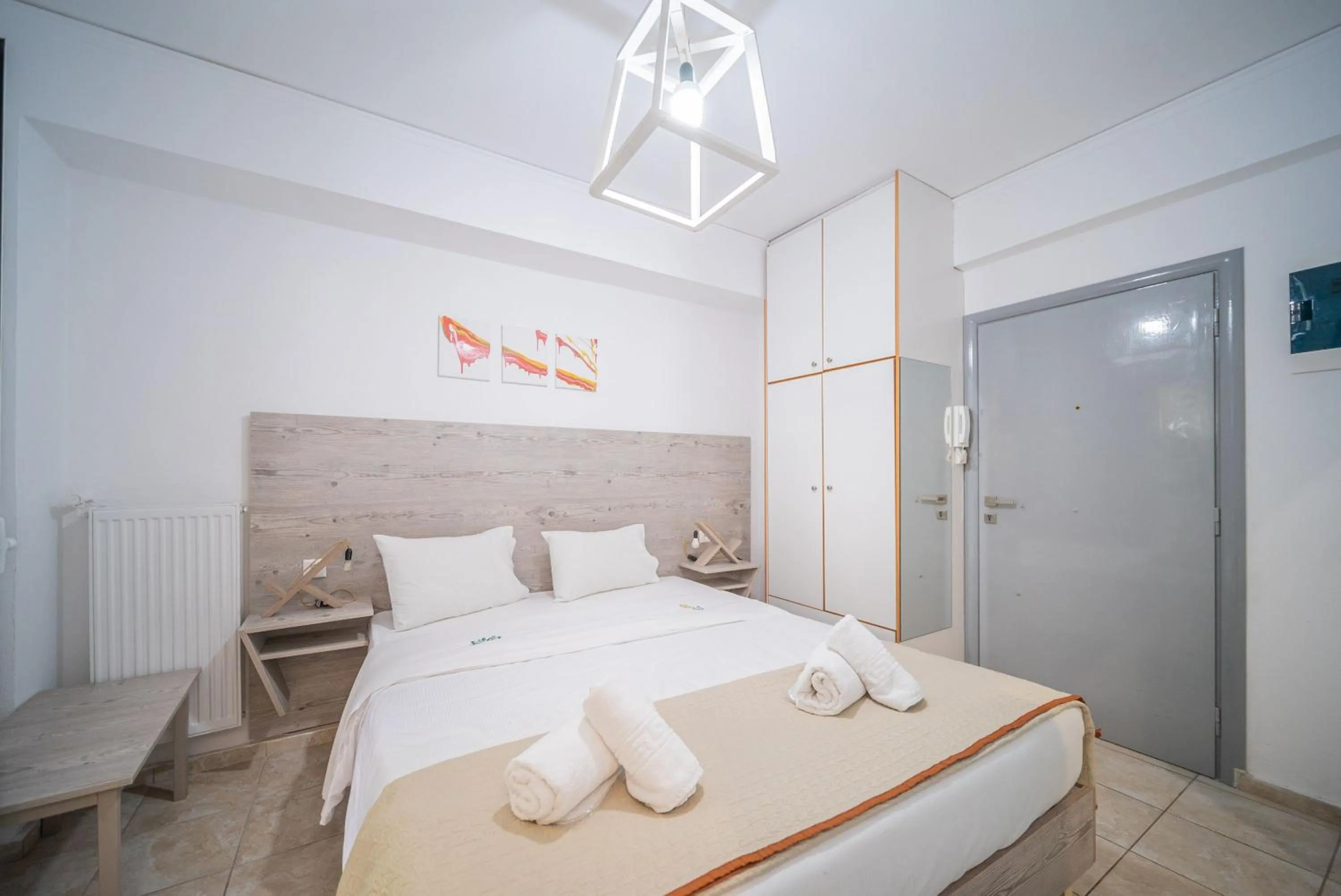 Bed in City Center Studios by Cretan Houses