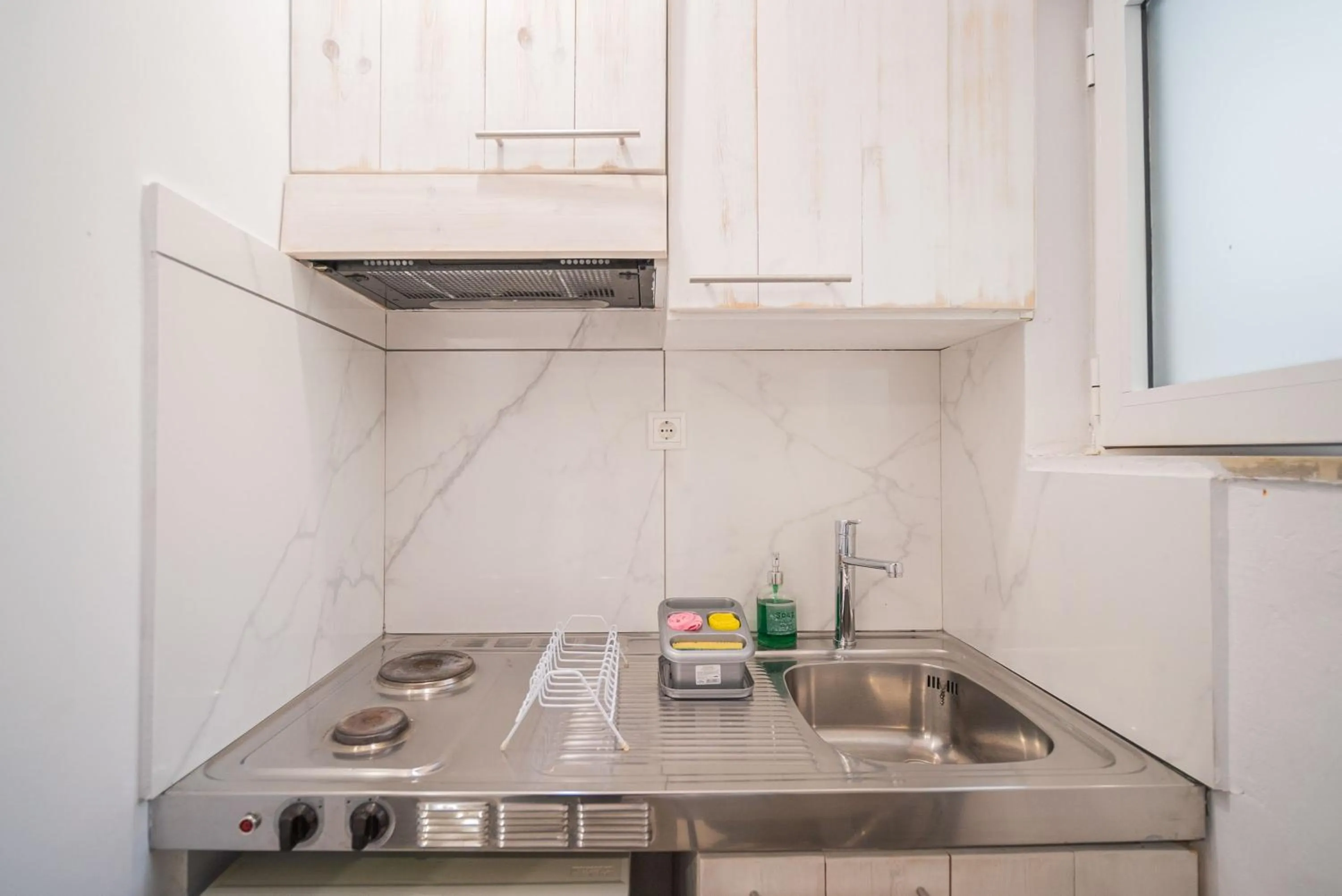 Kitchen or kitchenette in City Center Studios by Cretan Houses