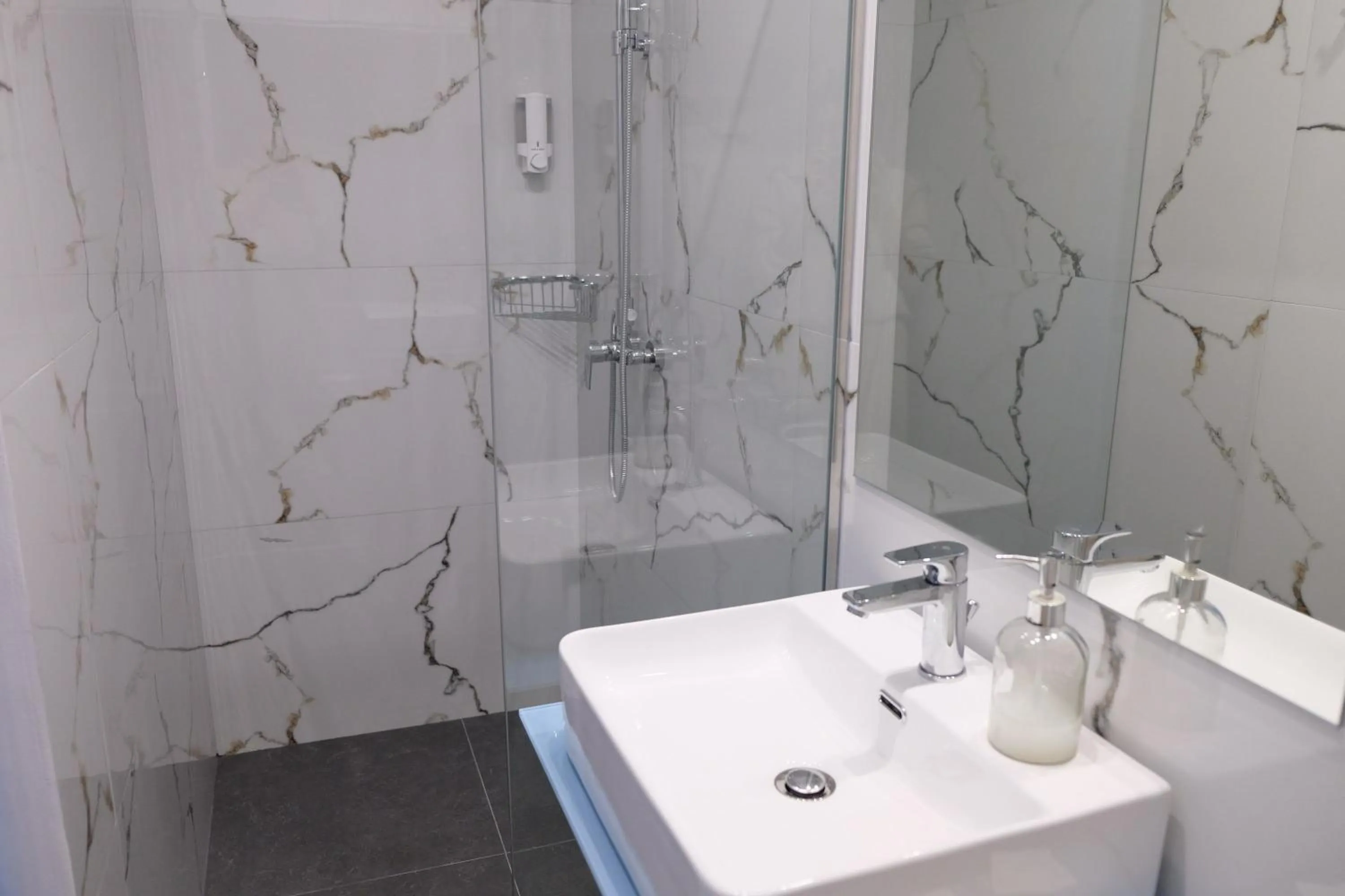 Shower in City Center Studios by Cretan Houses