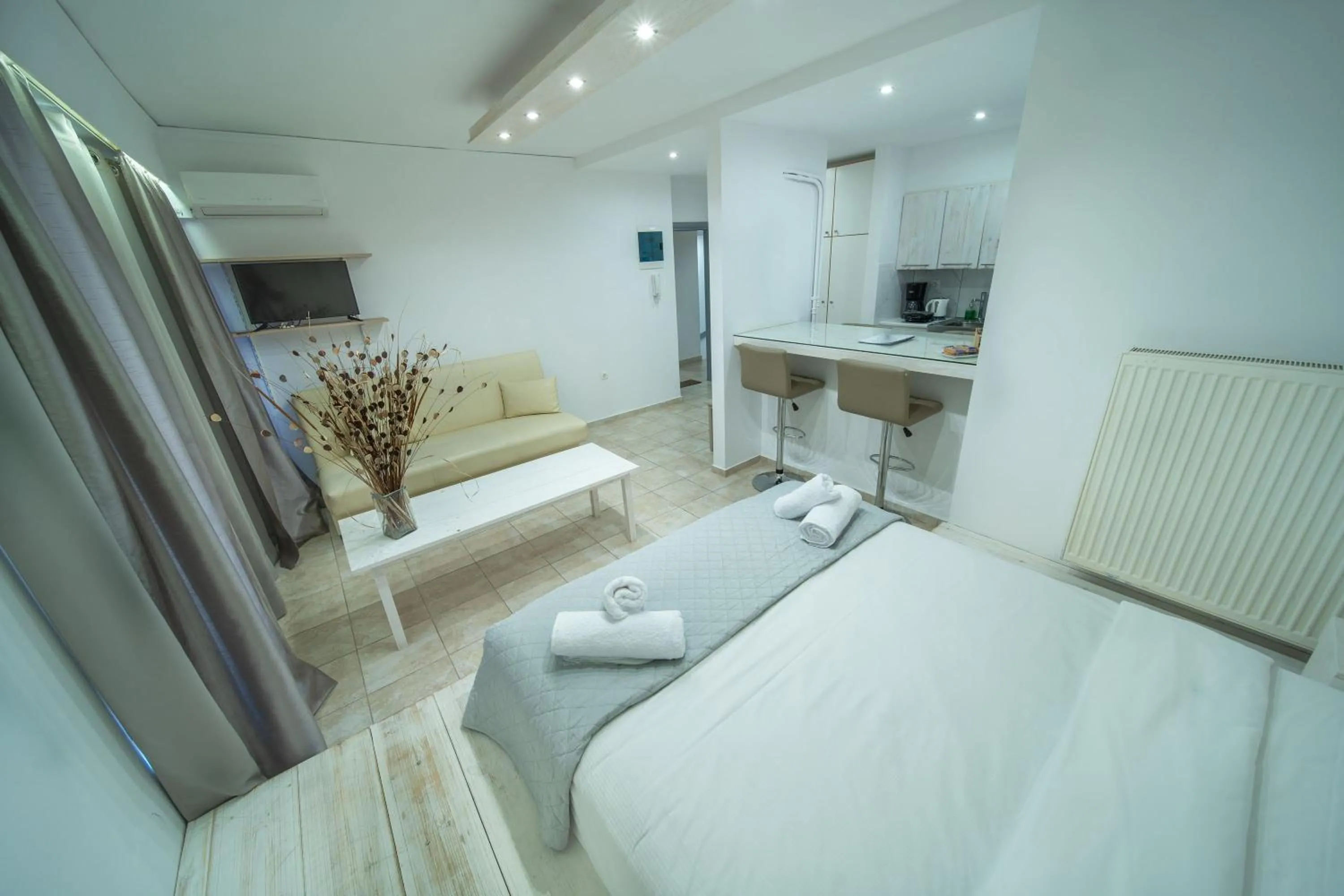 Bed in City Center Studios by Cretan Houses