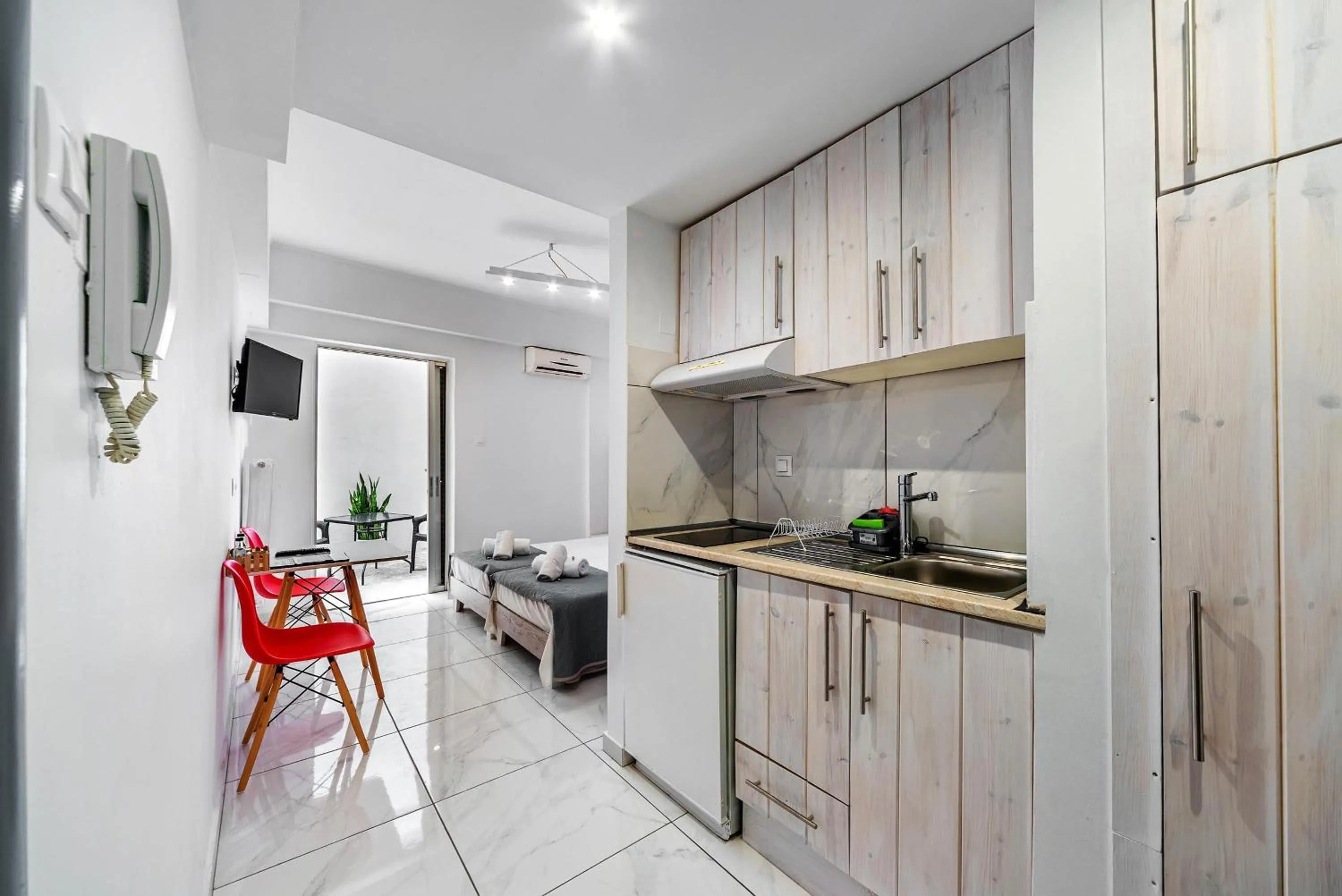 Kitchen or kitchenette in City Center Studios by Cretan Houses