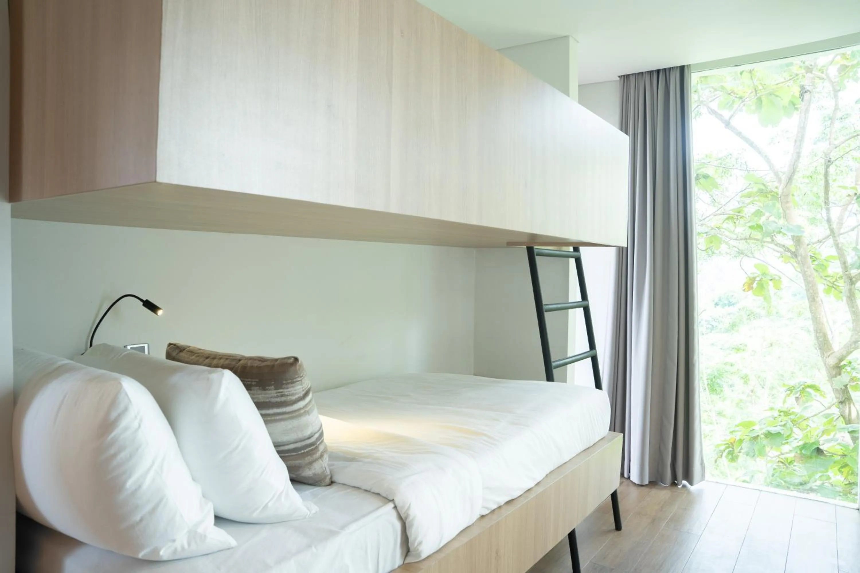 Bed in Selong Selo Resort and Villas