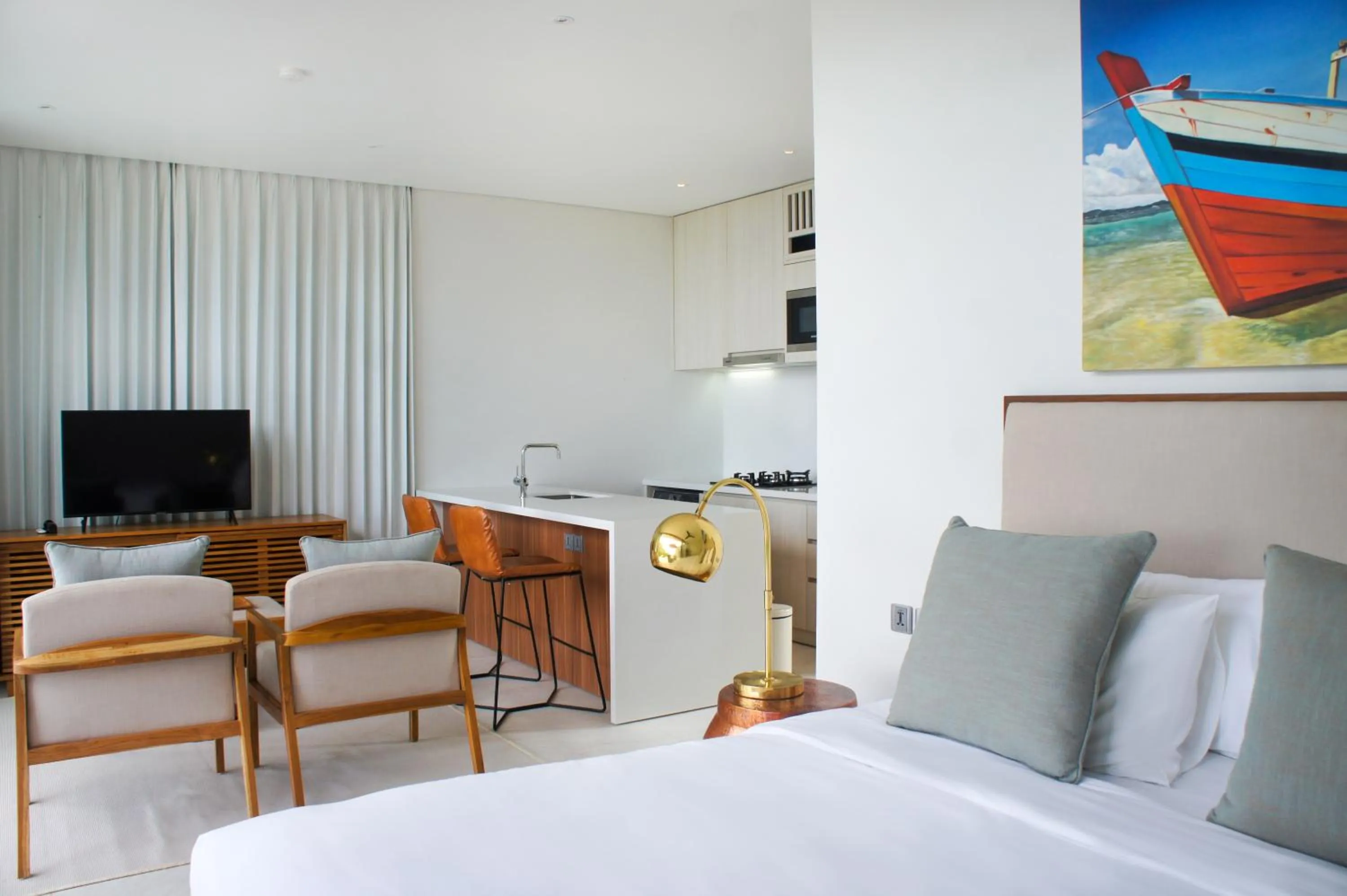 Kitchen or kitchenette, Bed in Selong Selo Resort and Villas