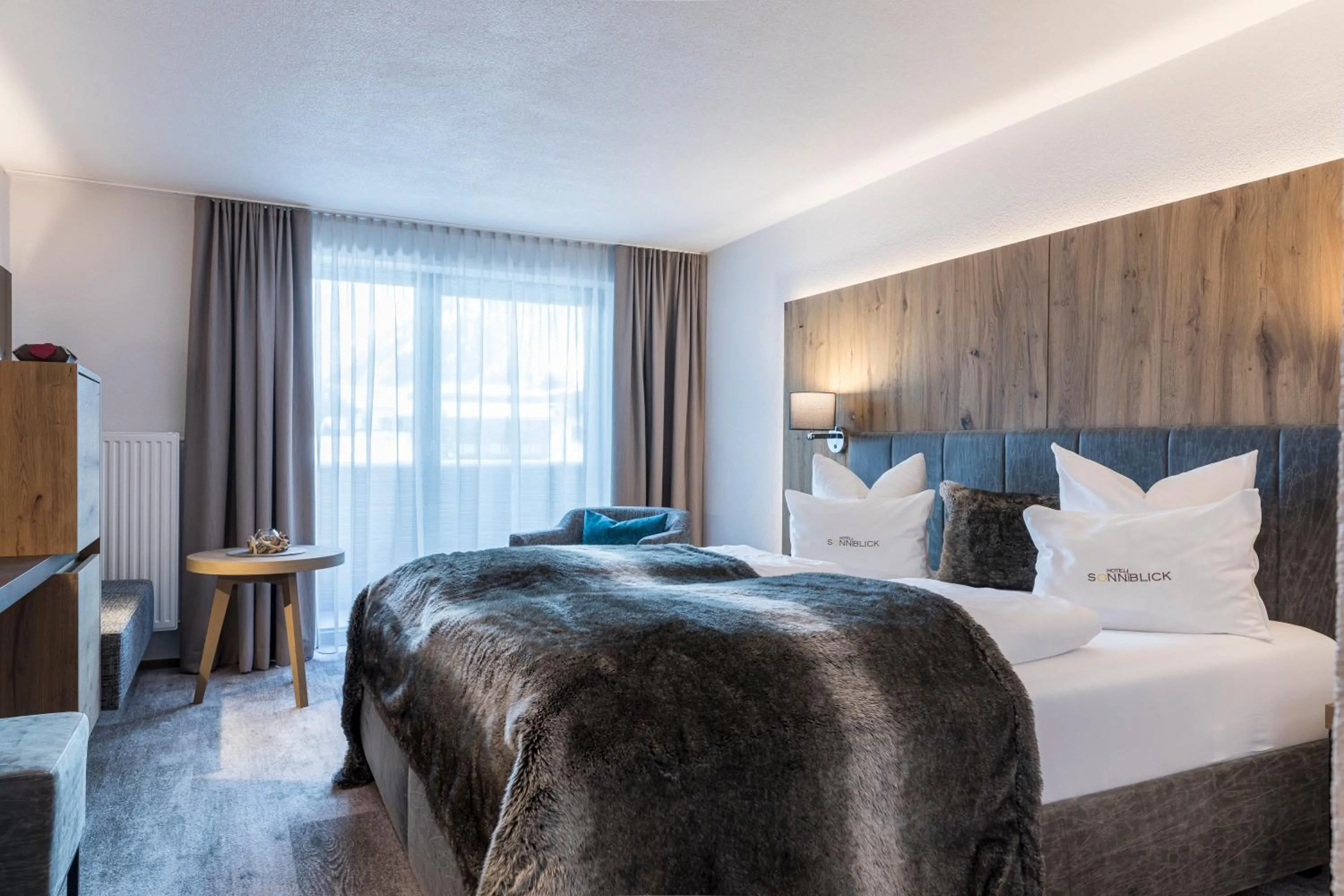 Bed in GenussHotel Sonnblick