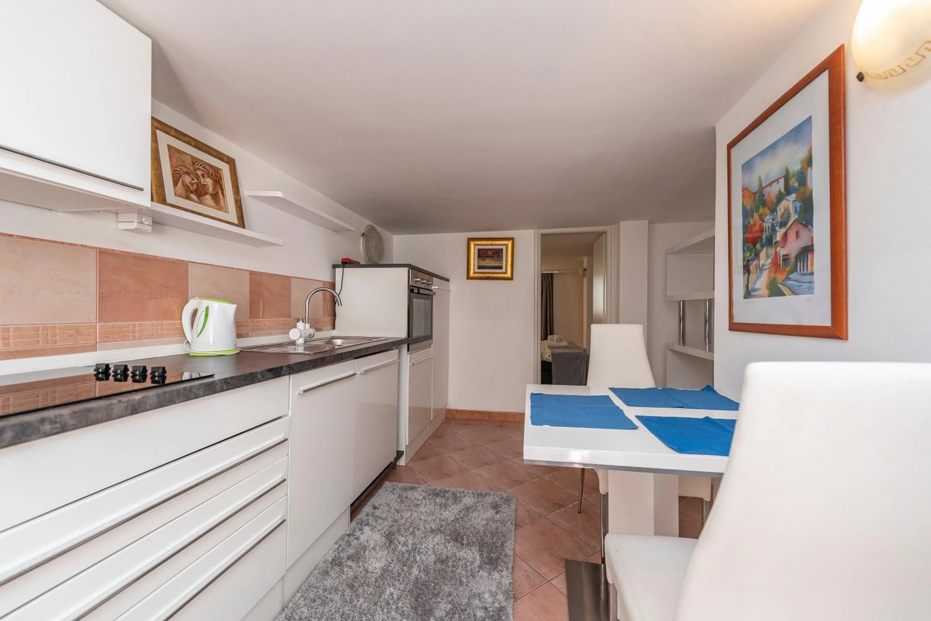 Kitchen or kitchenette in Villa Vanilla with Heated Pool