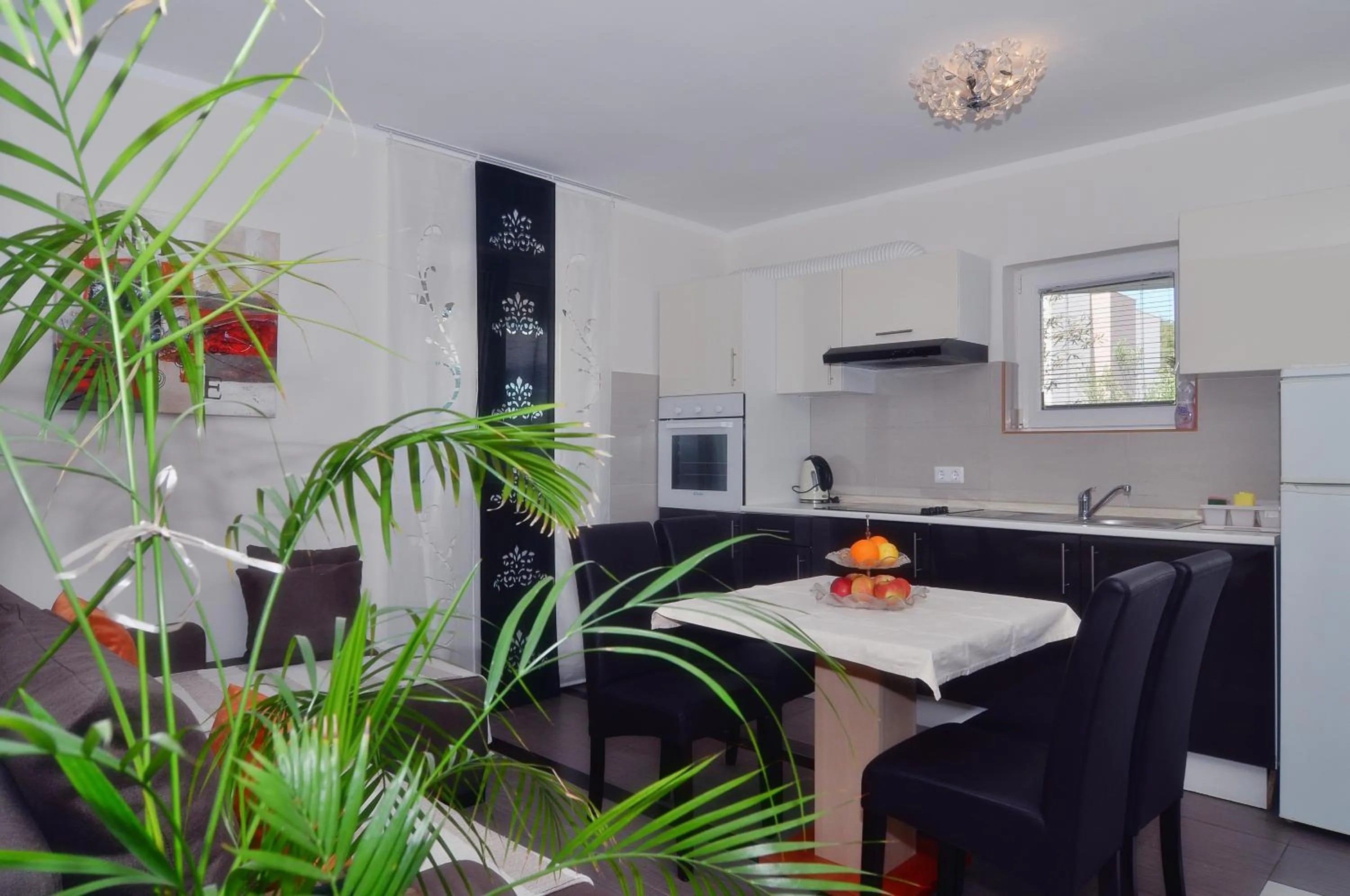 Kitchen or kitchenette in Villa Vanilla with Heated Pool