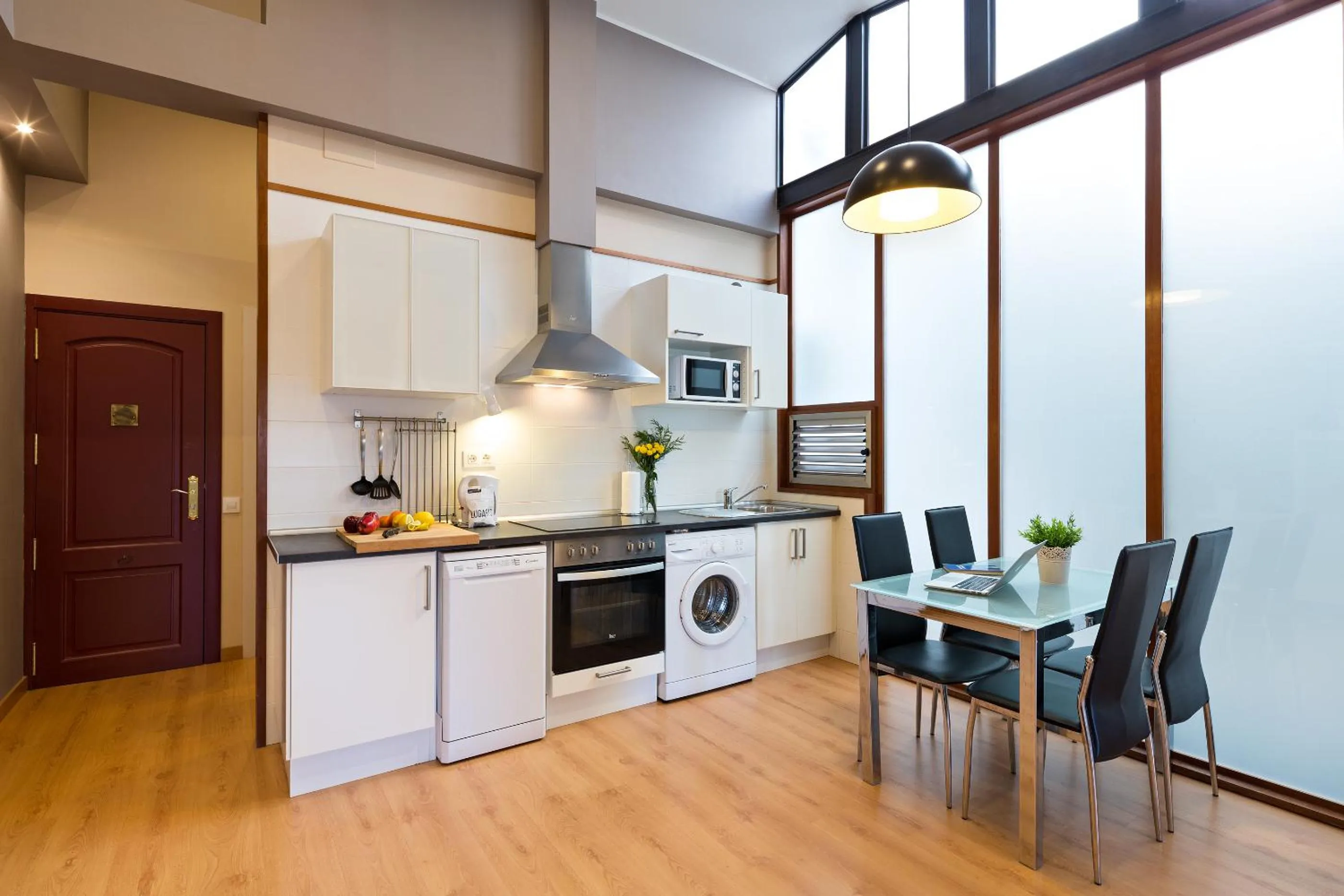 Kitchen or kitchenette in Lugaris Rambla Apartments