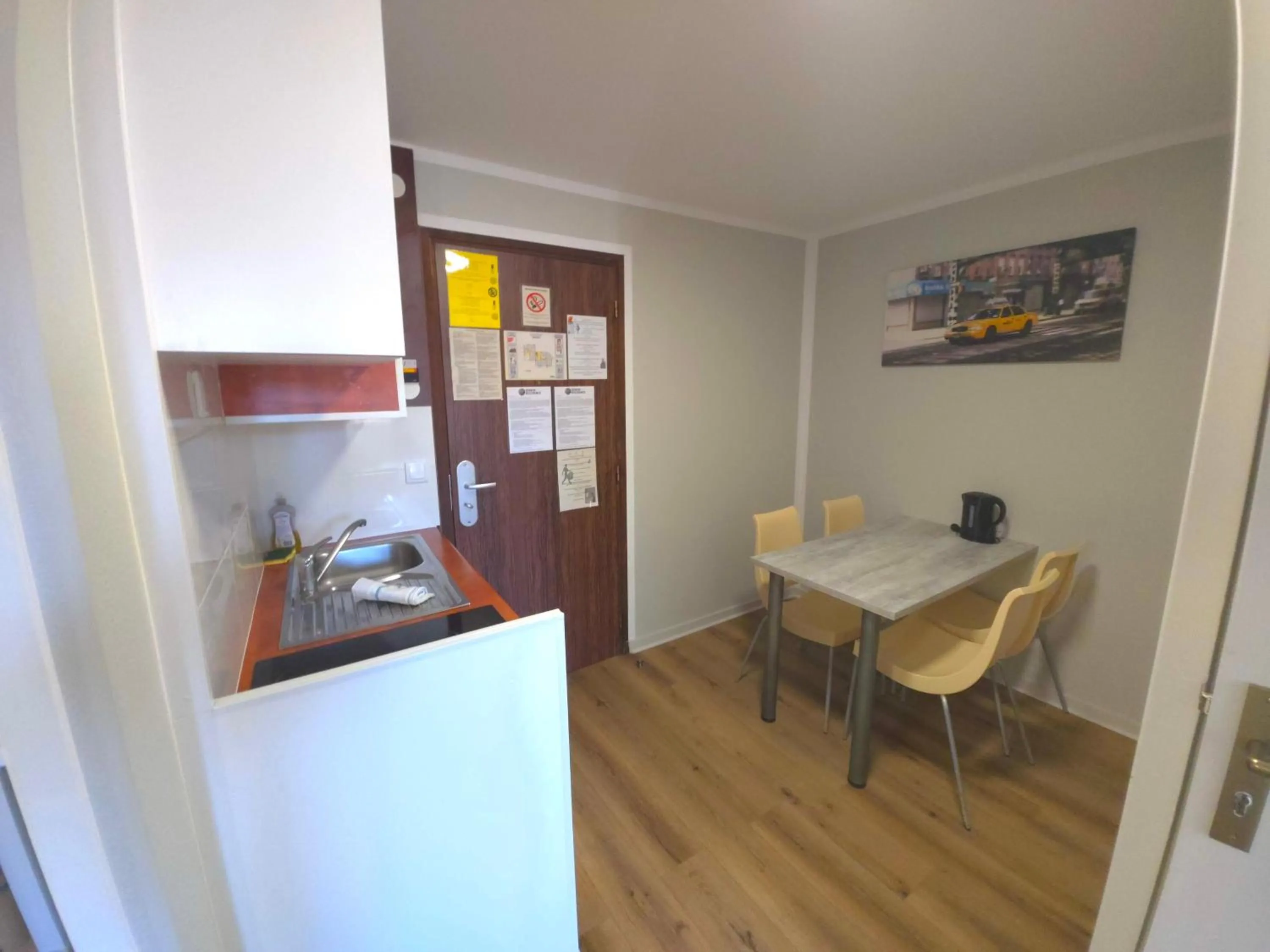 Kitchen or kitchenette in Geneva Residence