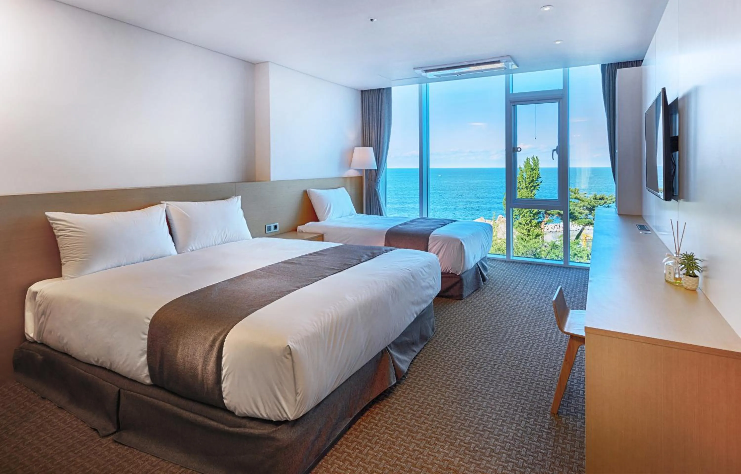 Bed in Naksan Beach Hotel