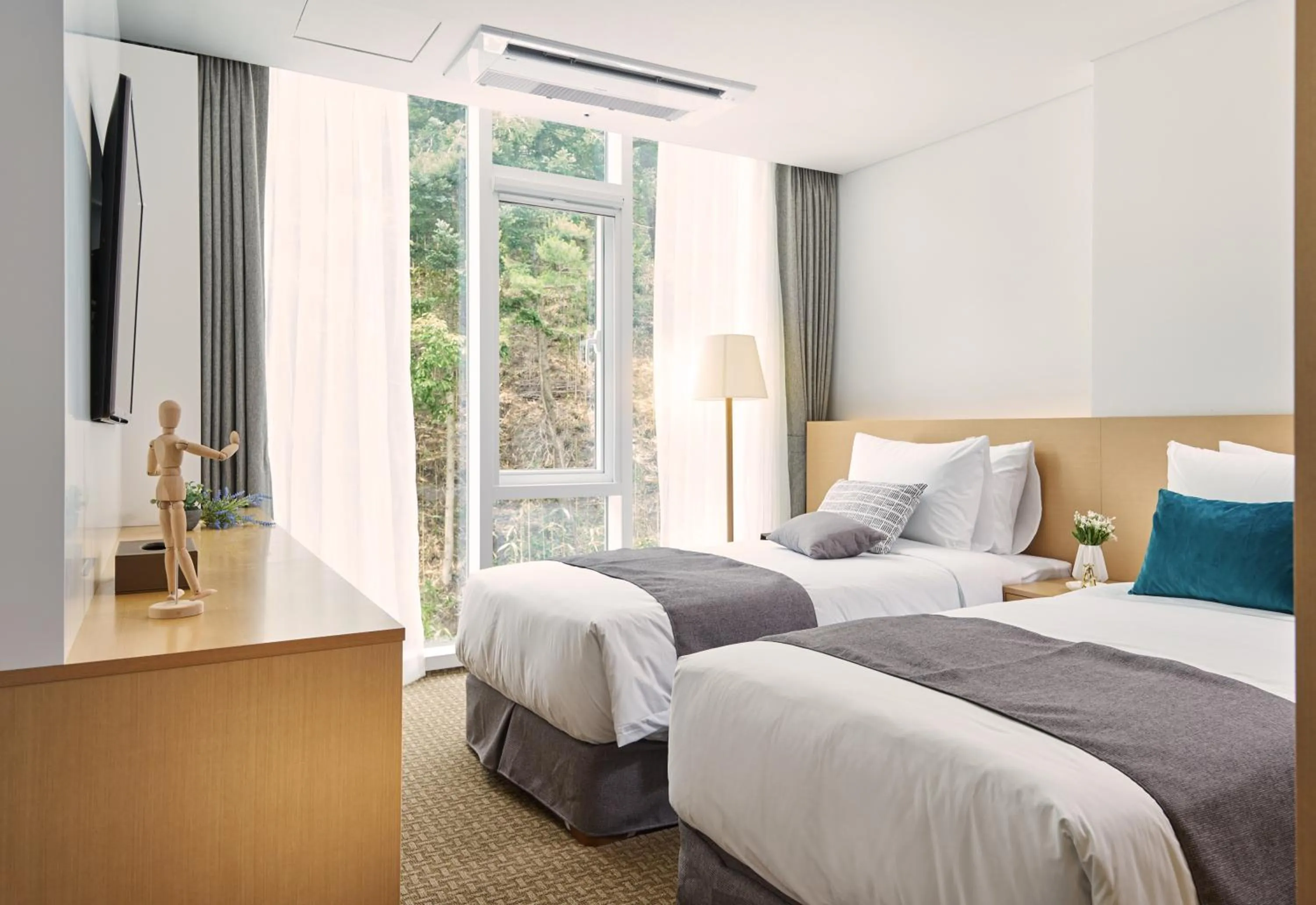 Bed in Naksan Beach Hotel