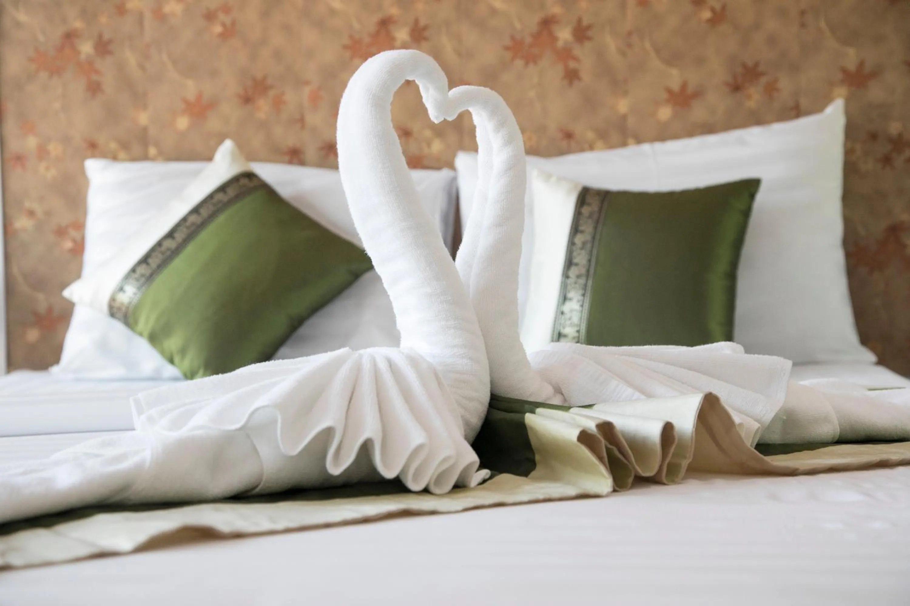 towels, Bed in West Key Kamala Apartment